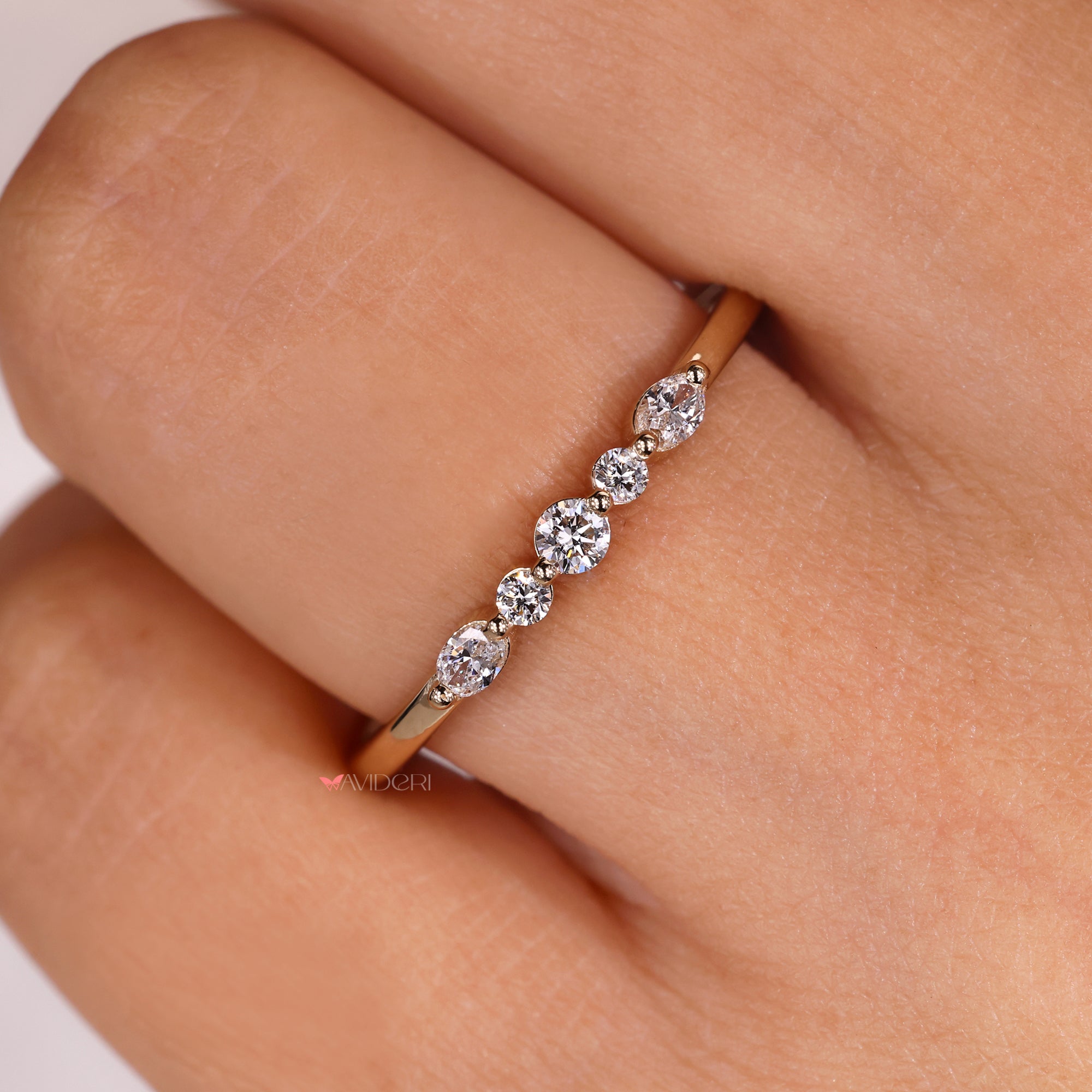 Oval diamond band with five stone wedding band.