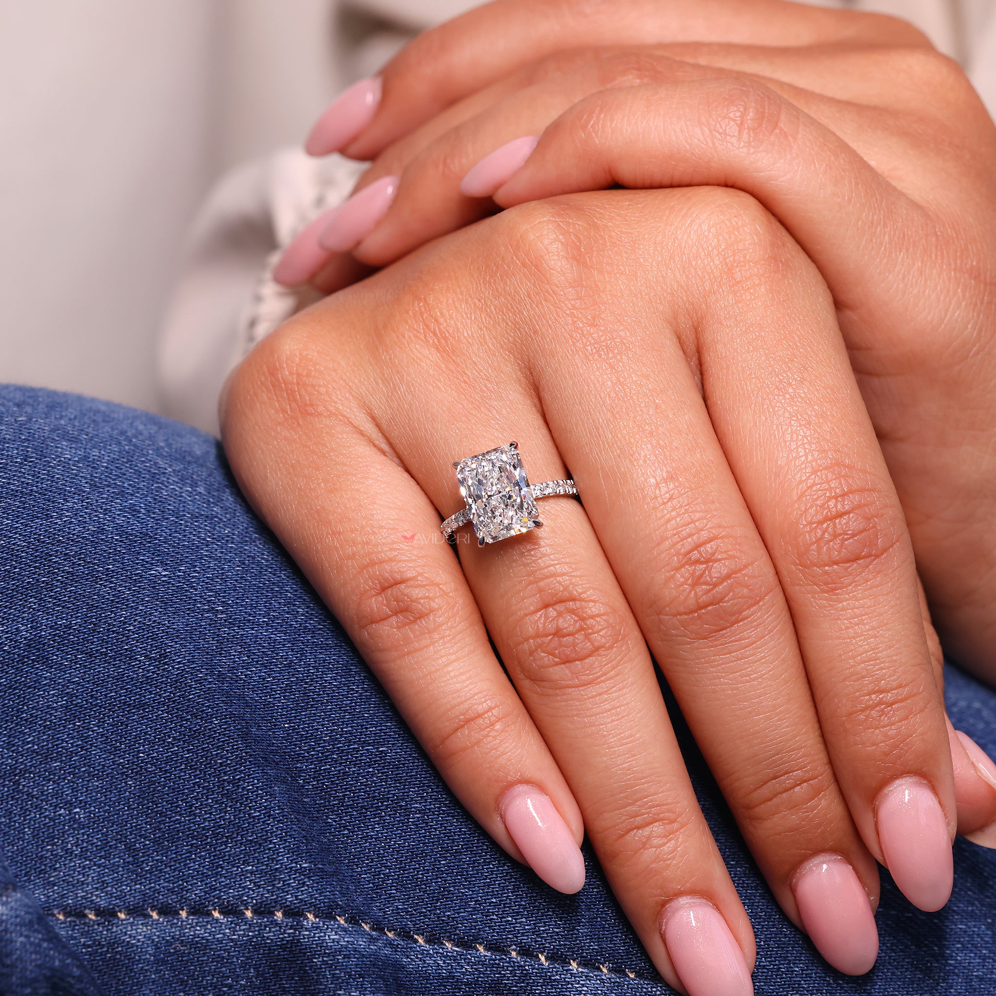 Radiant Engagement Ring with a stunning diamond set in white gold.
