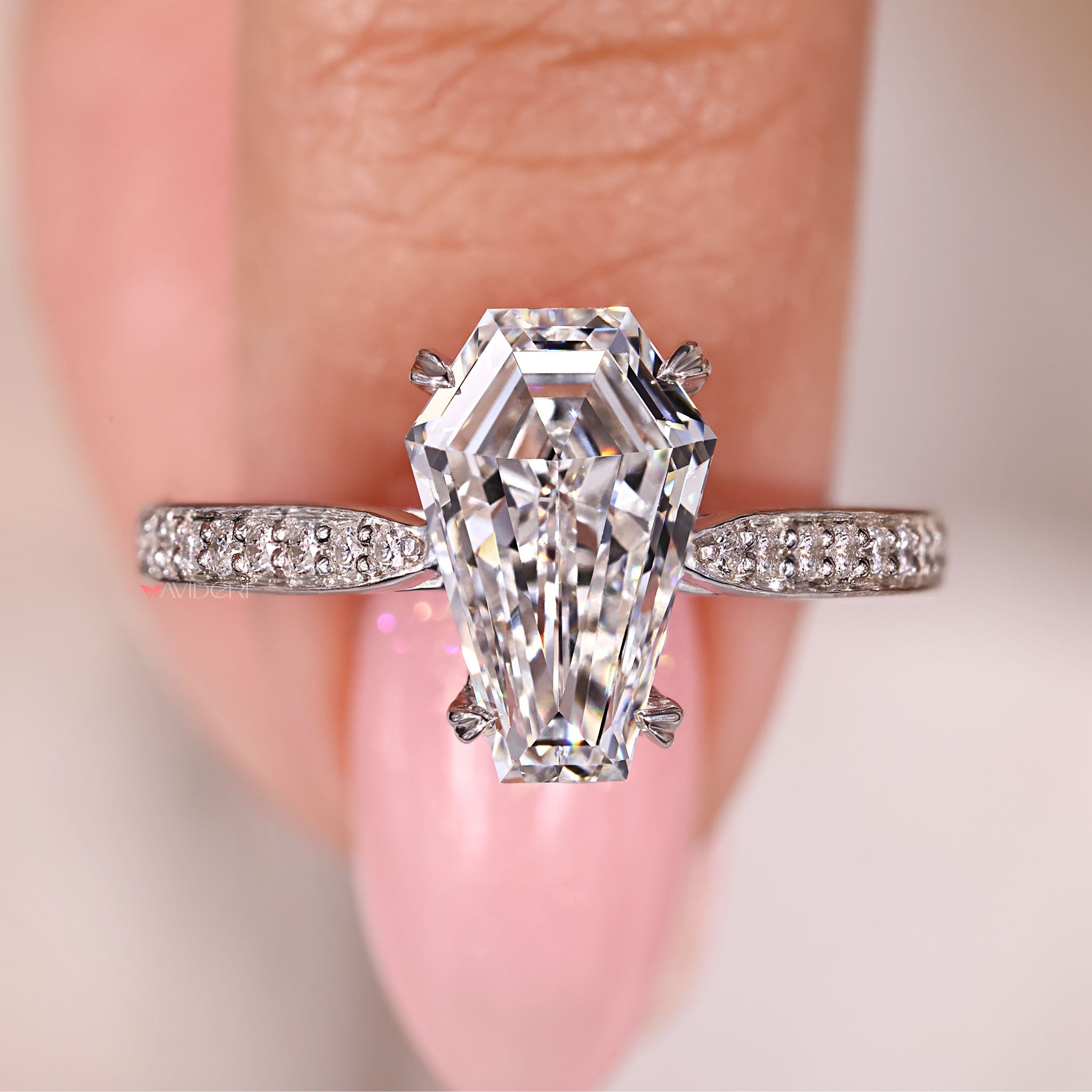 Coffin engagement ring with 4 heart prong setting and Lab Grown Diamond.