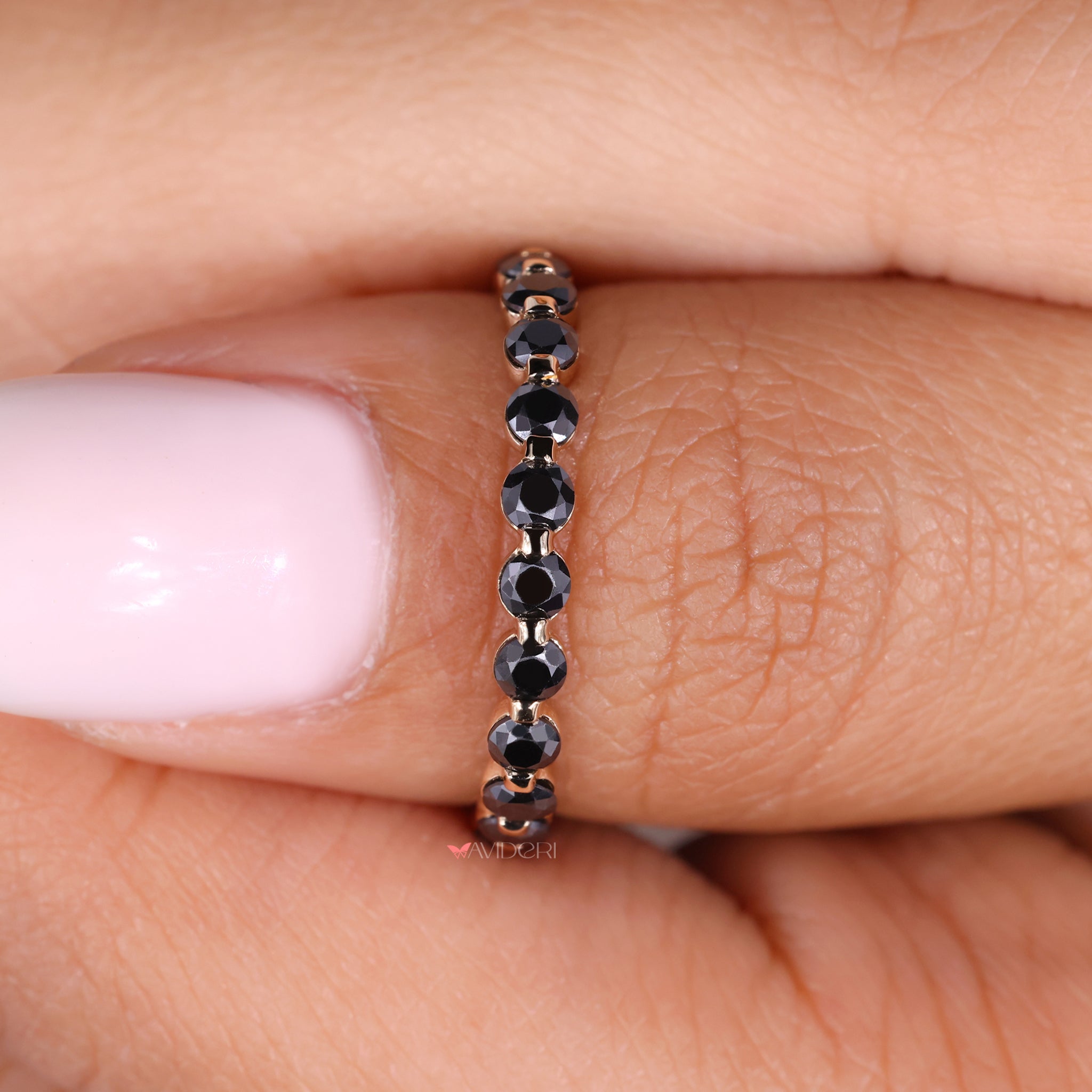 This round wedding band offers a timeless, symmetrical look.