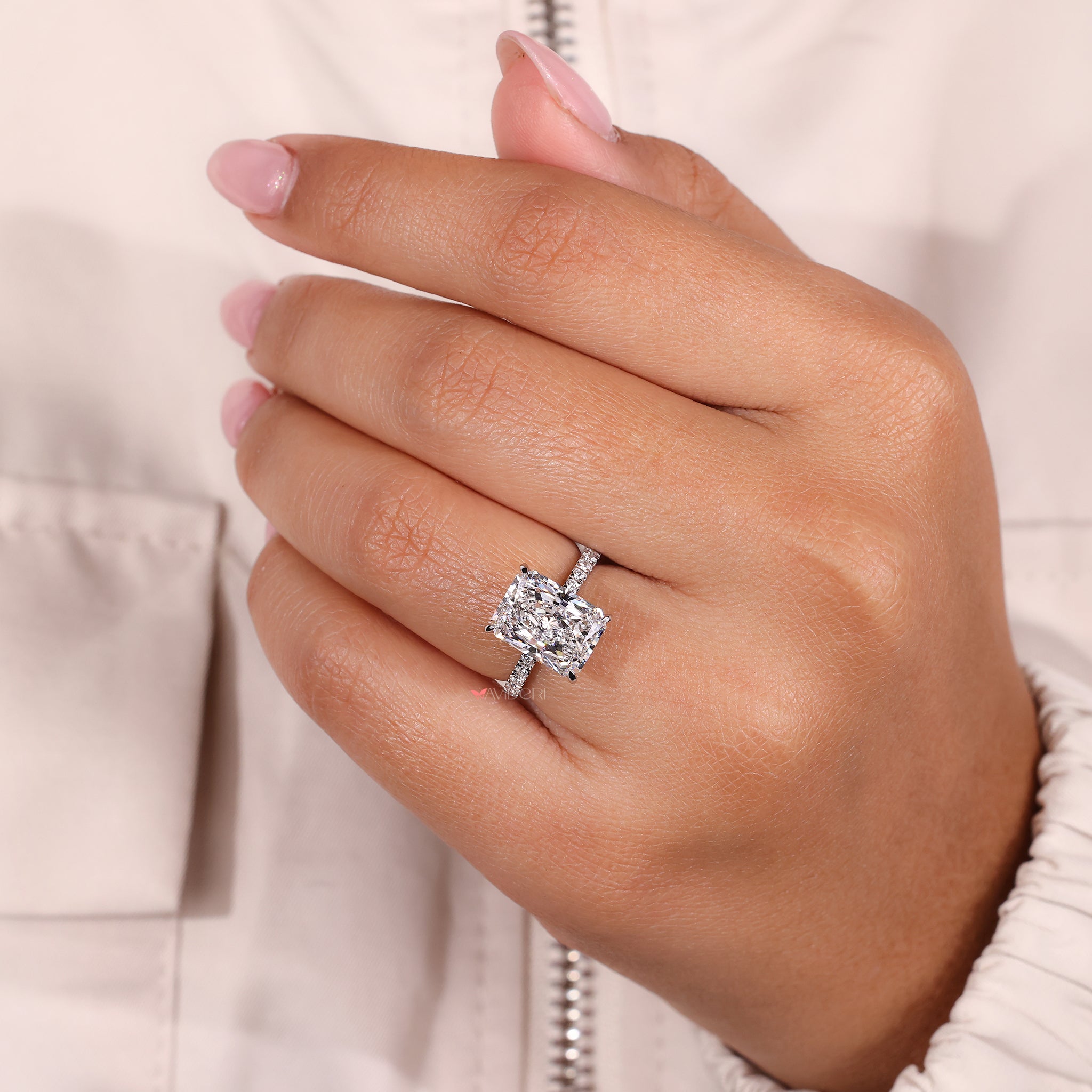 Handmade Jewelry with a radiant cut diamond, perfect for a custom engagement.