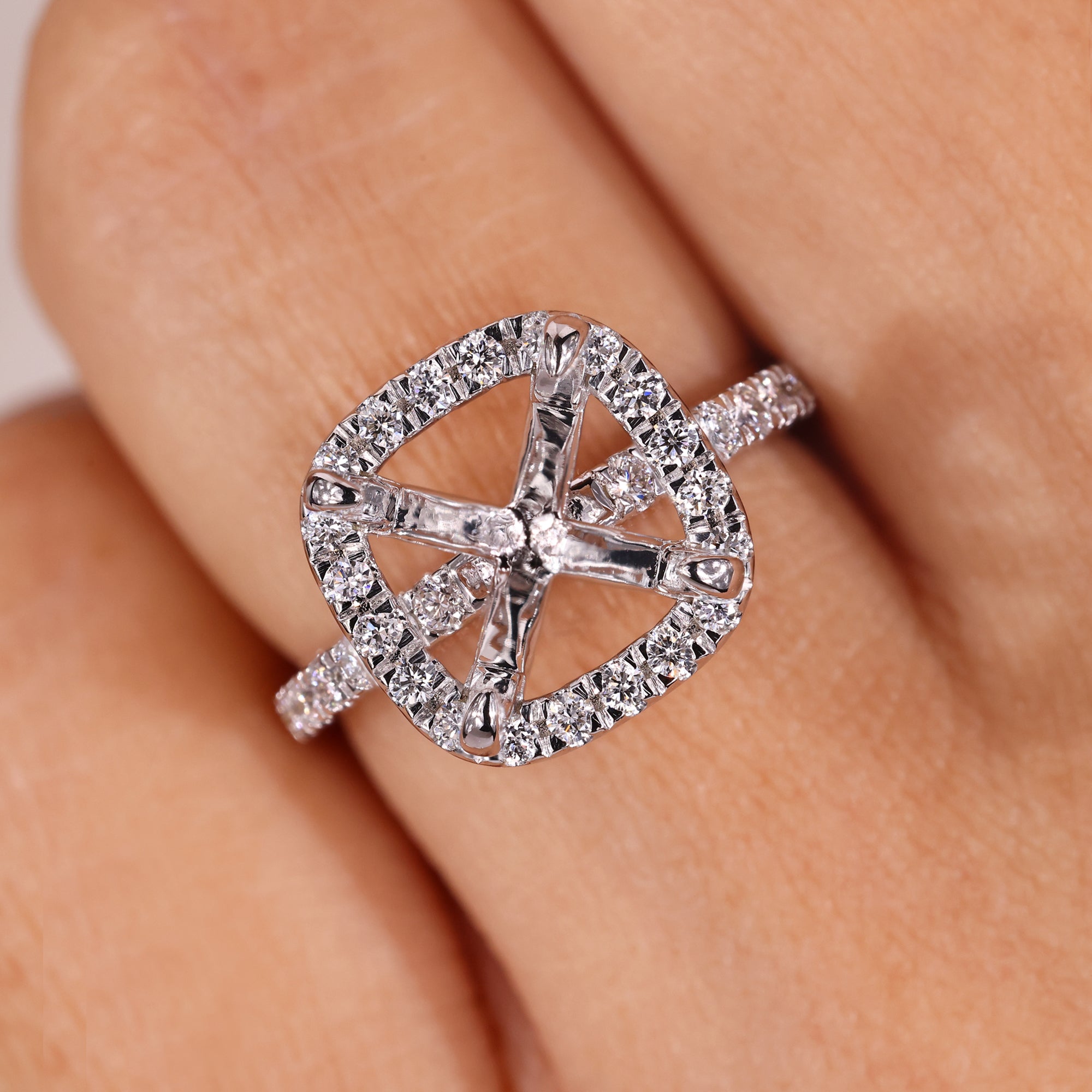 Princess cut semi mount diamond ring setting.