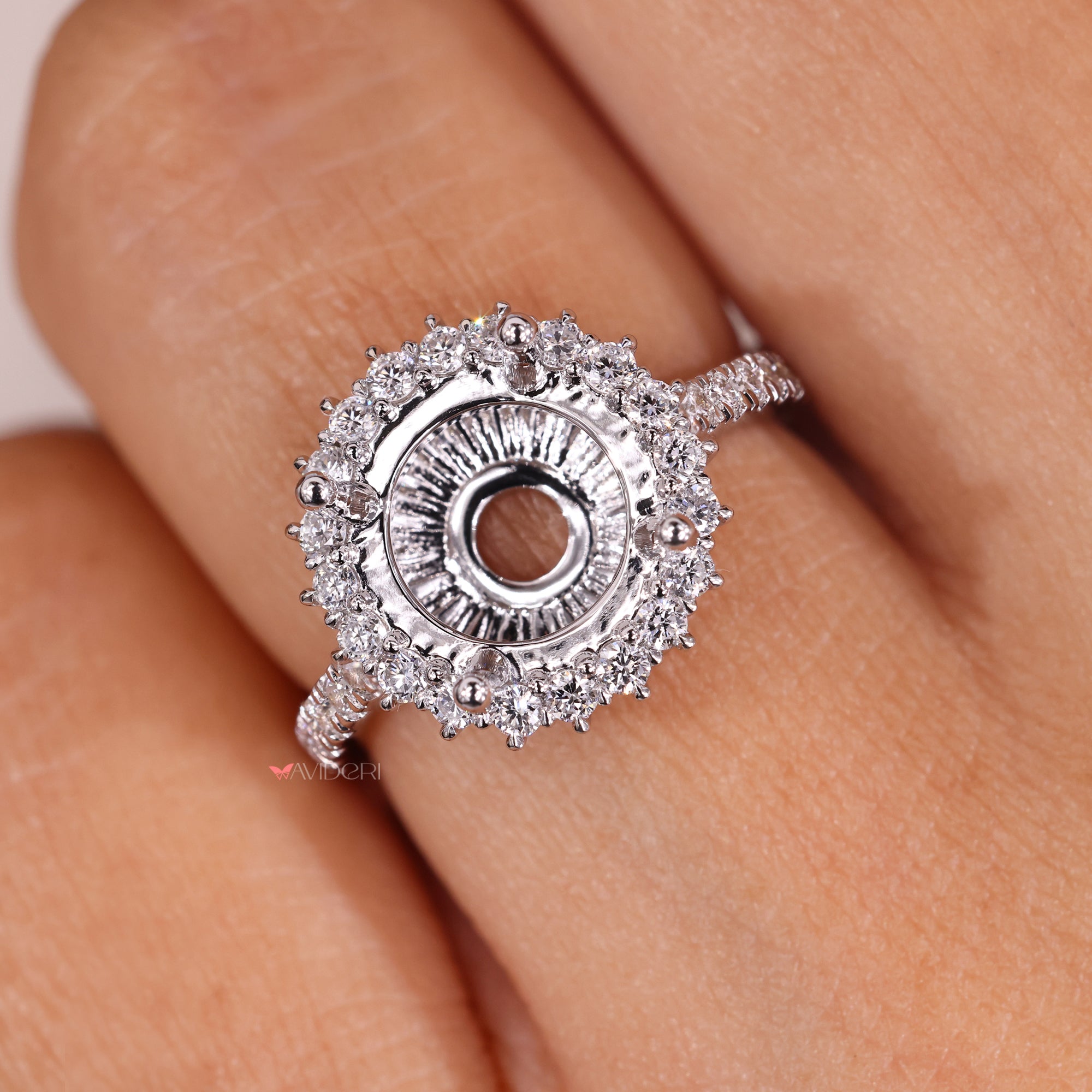 Custom semi mount engagement ring with pave setting.