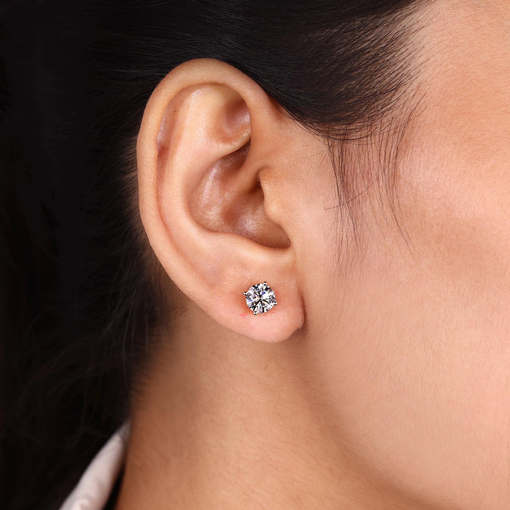 Simple diamond stud earrings crafted by Avideri.