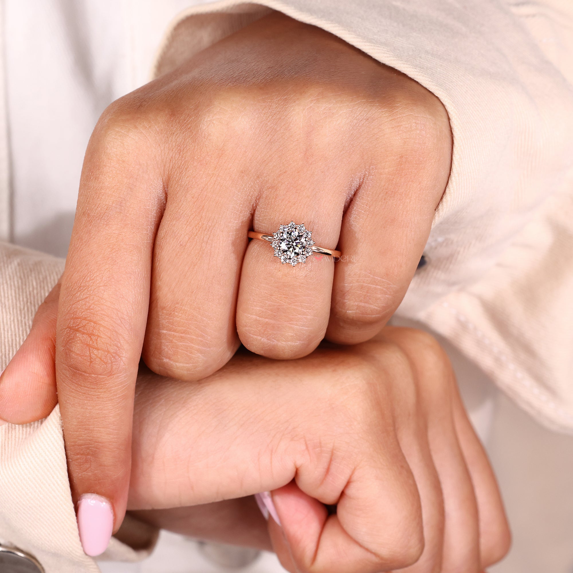 round cut halo engangement ring.