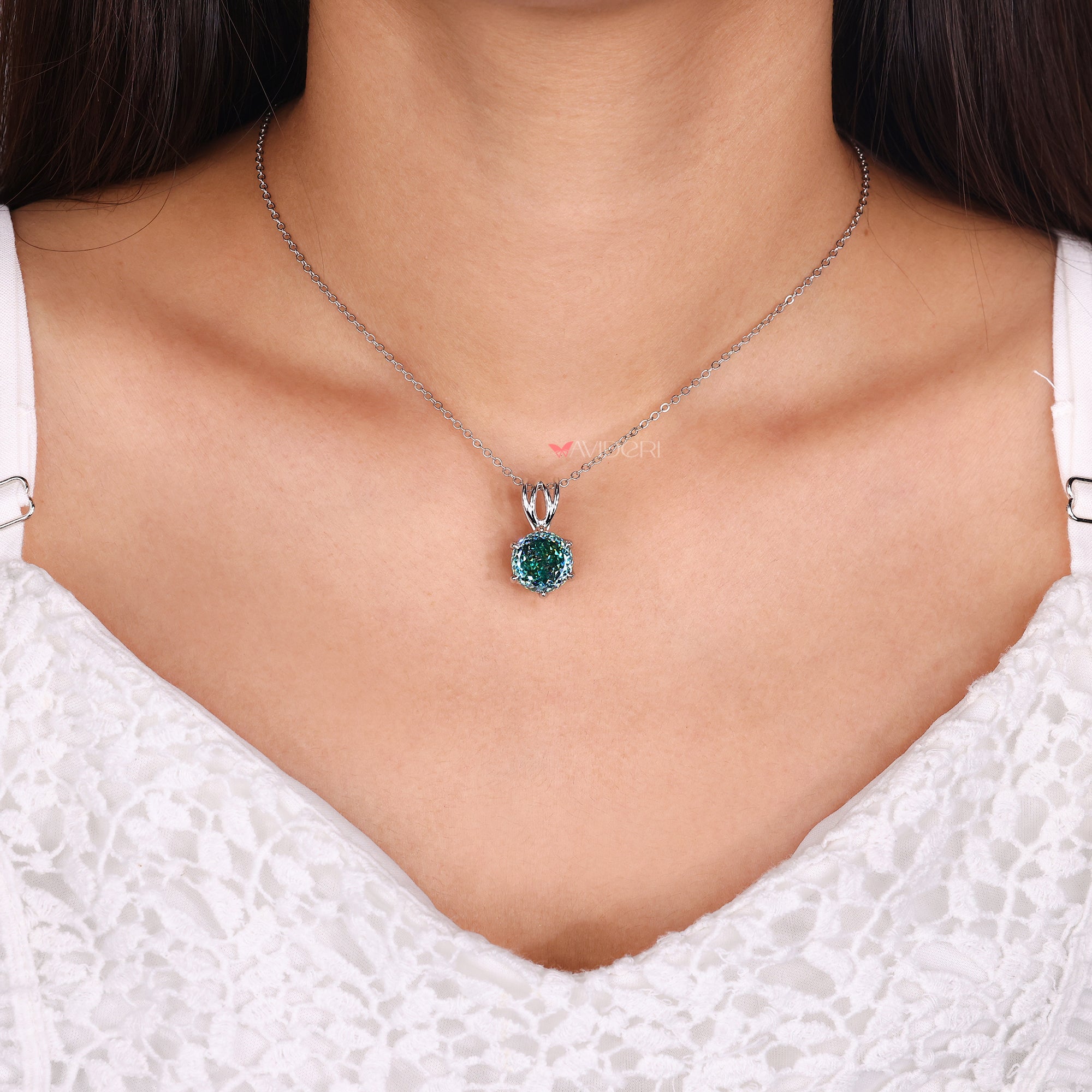 Six claw prong setting holds the stone in place securely.