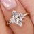 Marquise diamond engagement ring crafted with baguette and round side stones in yellow gold.
 Marquise diamond engagement ring crafted with baguette and round side stones in yellow gold.