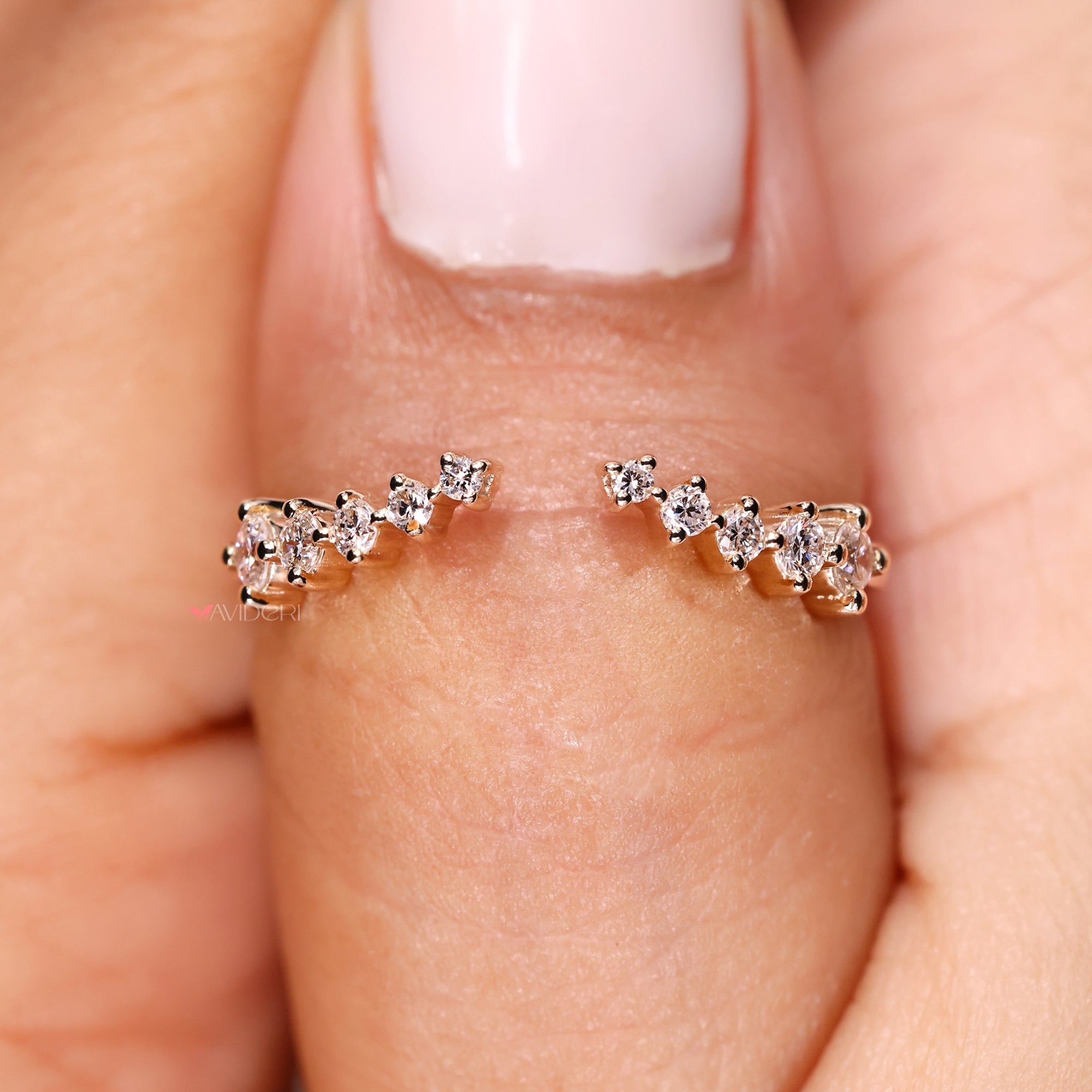 Handmade jewelry featuring open gap diamond band.