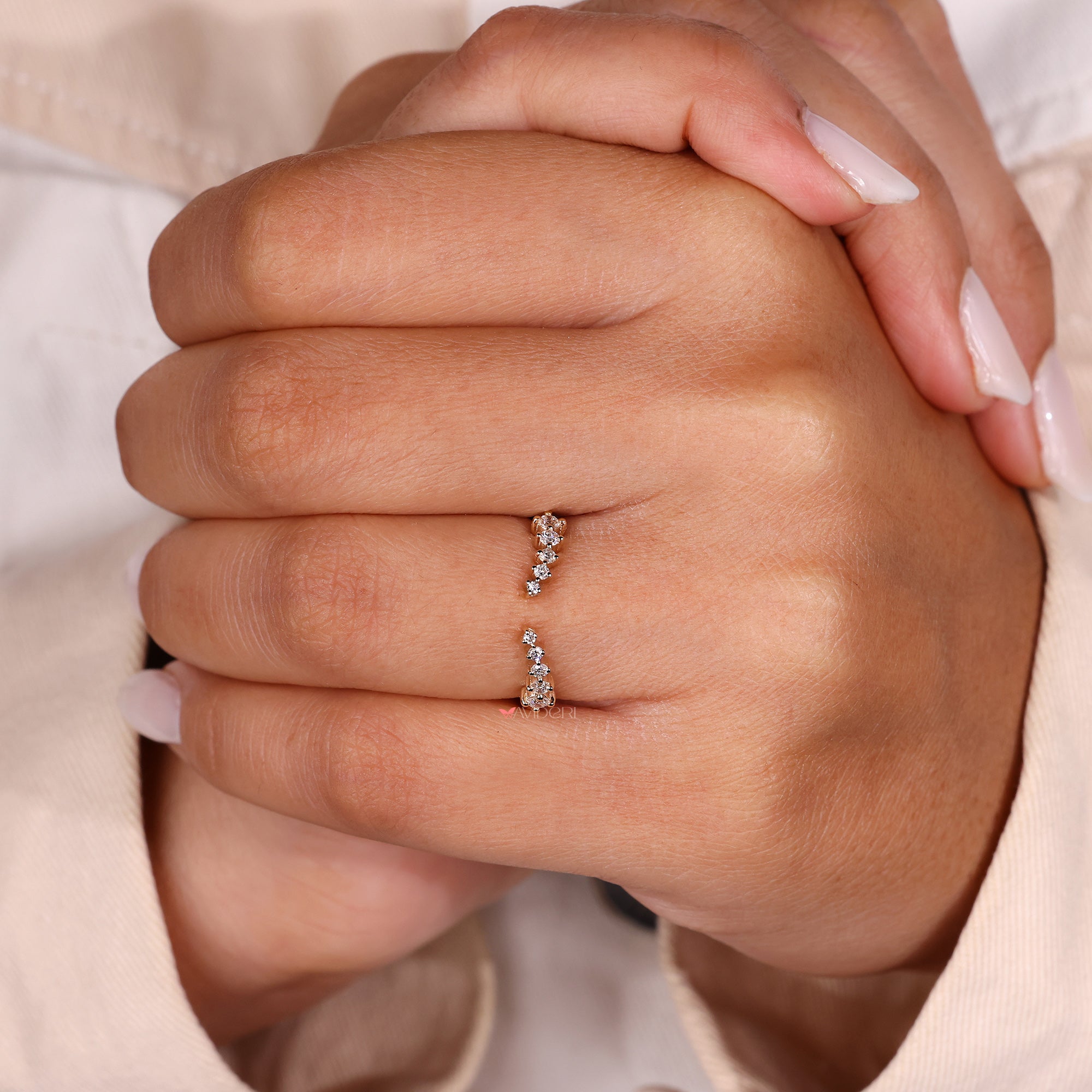 Elegant curved wedding band with round lab grown diamonds.