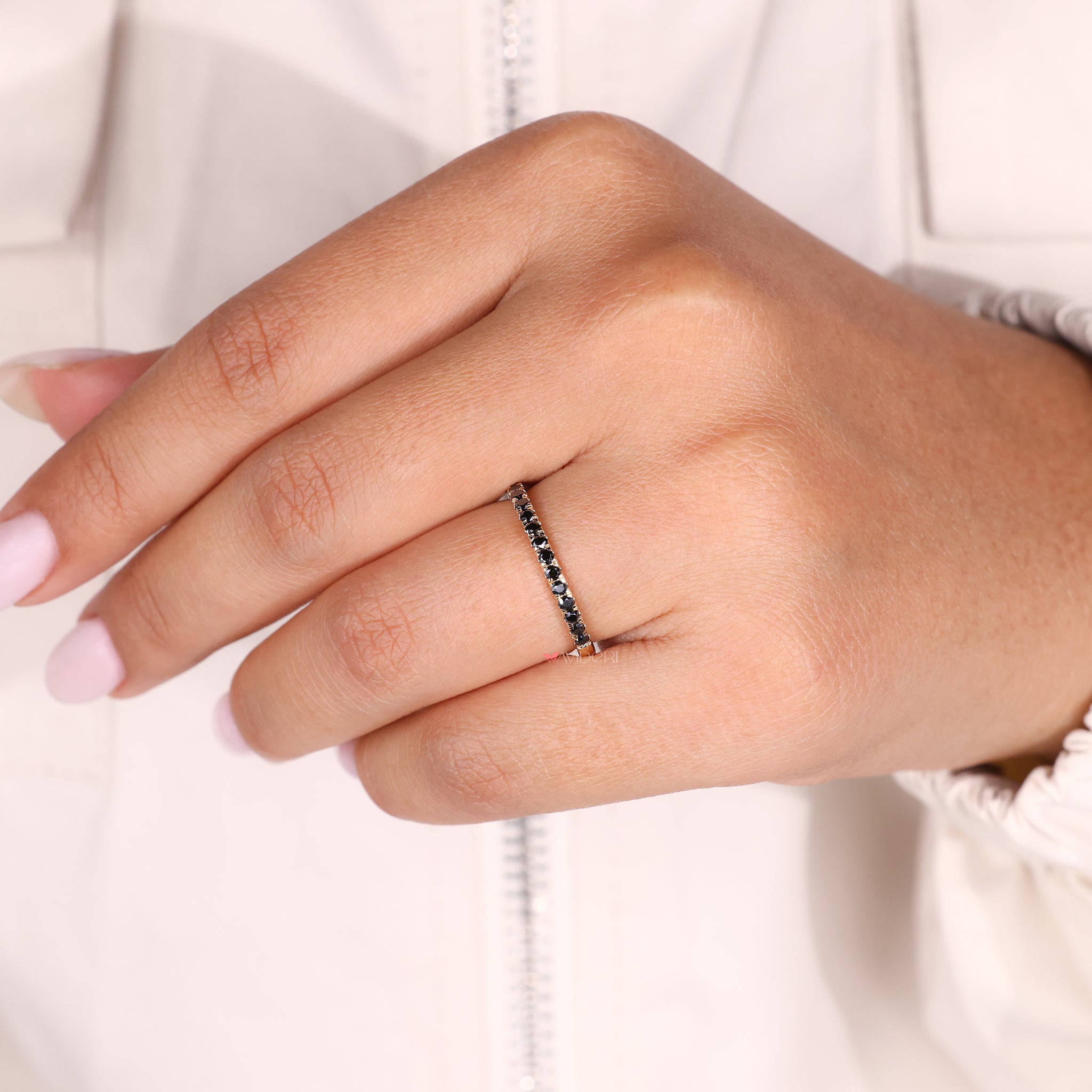 Half eternity band set in a Yellow gold band for a stunning design.