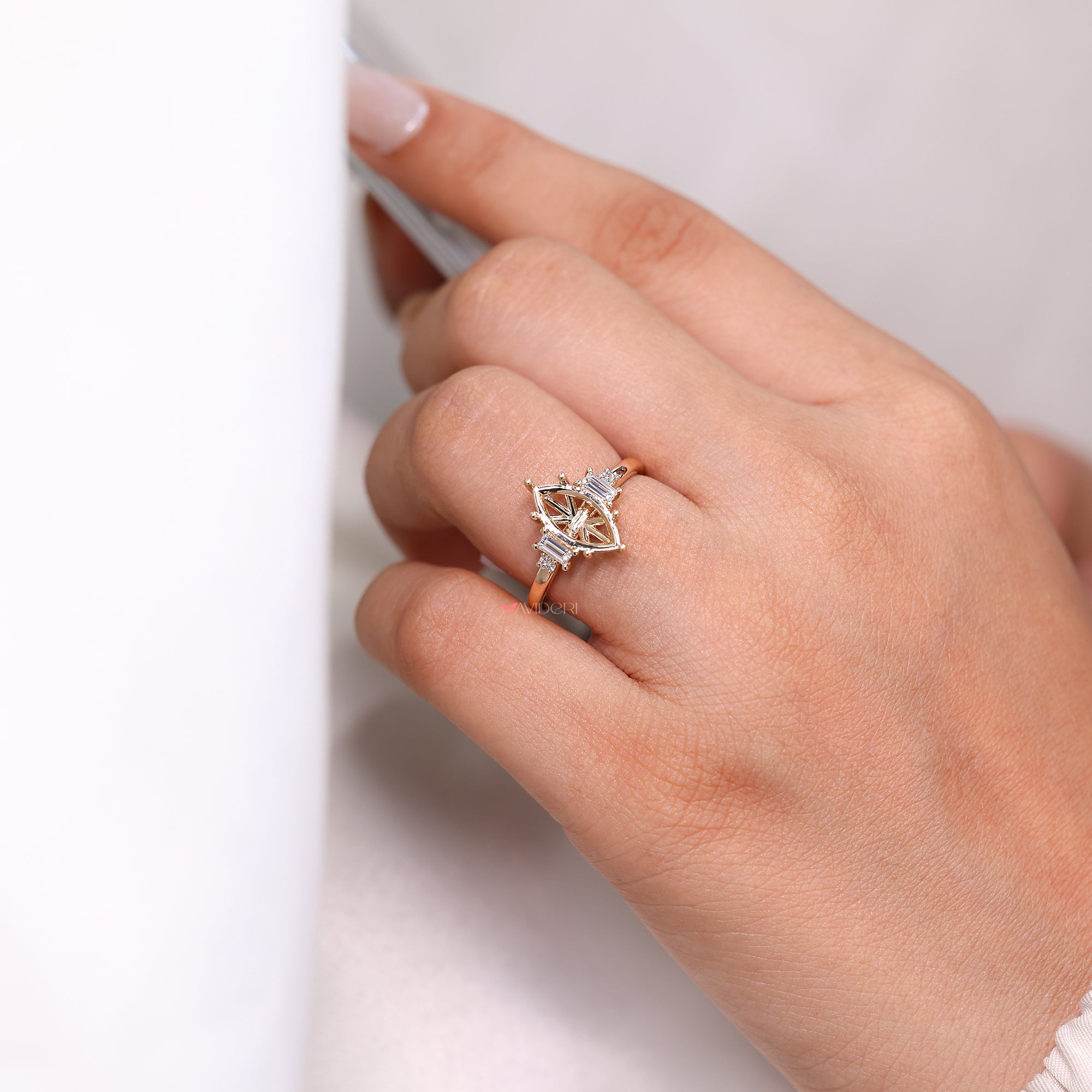 Handmade ring with six prong setting for center stone.