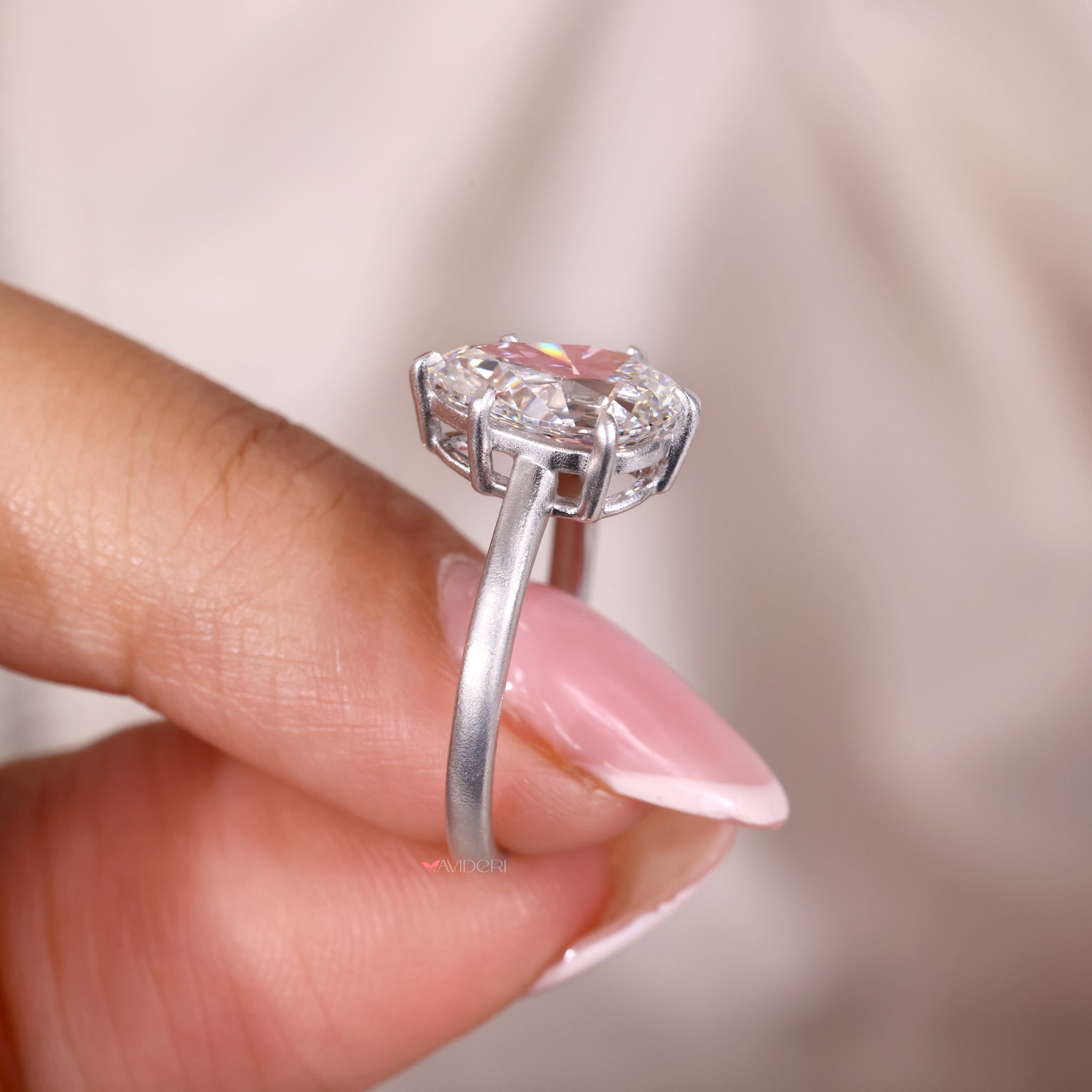 Pear shape engagement ring featuring a brilliant pear diamond.