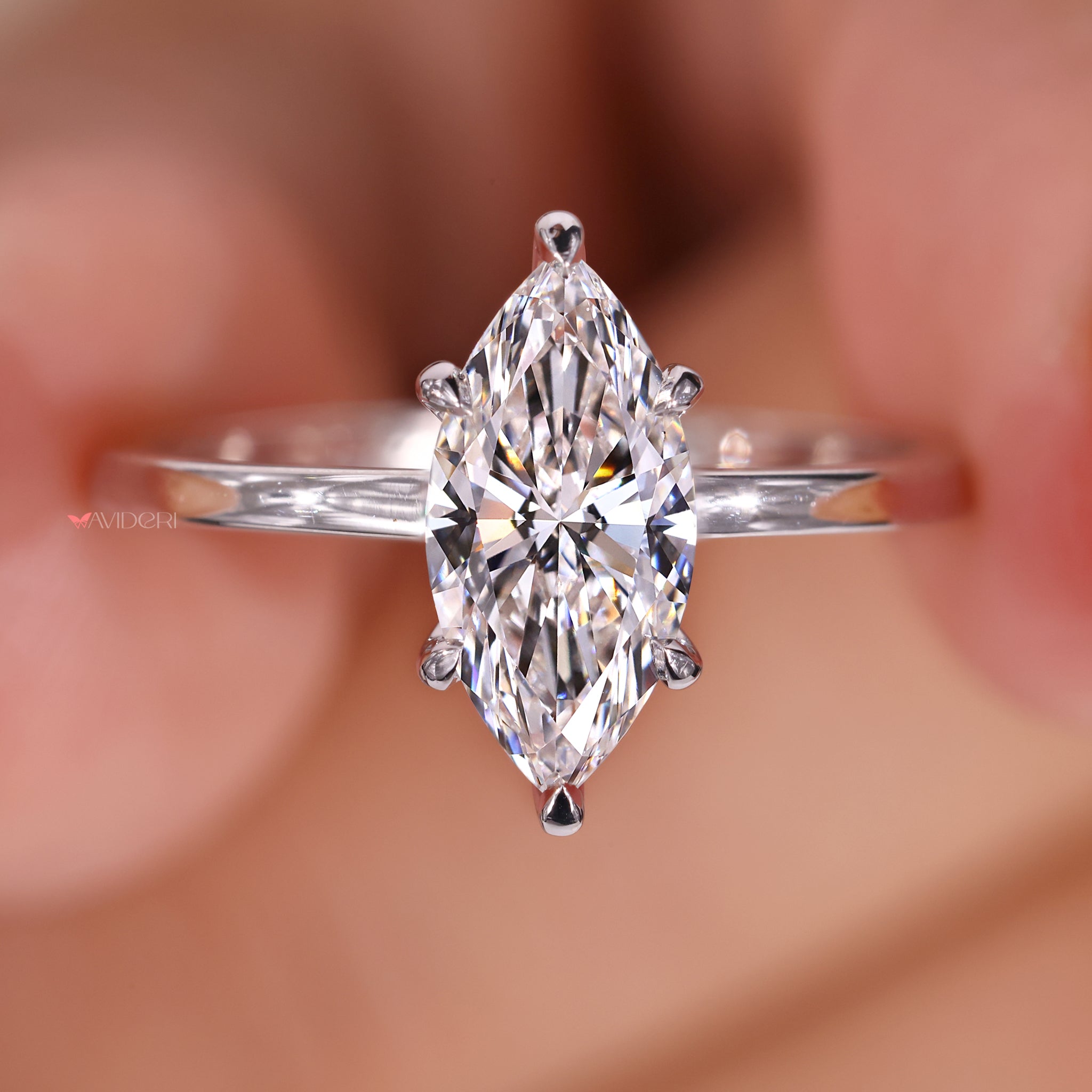 Claw prong ring showcasing a solitaire diamond.