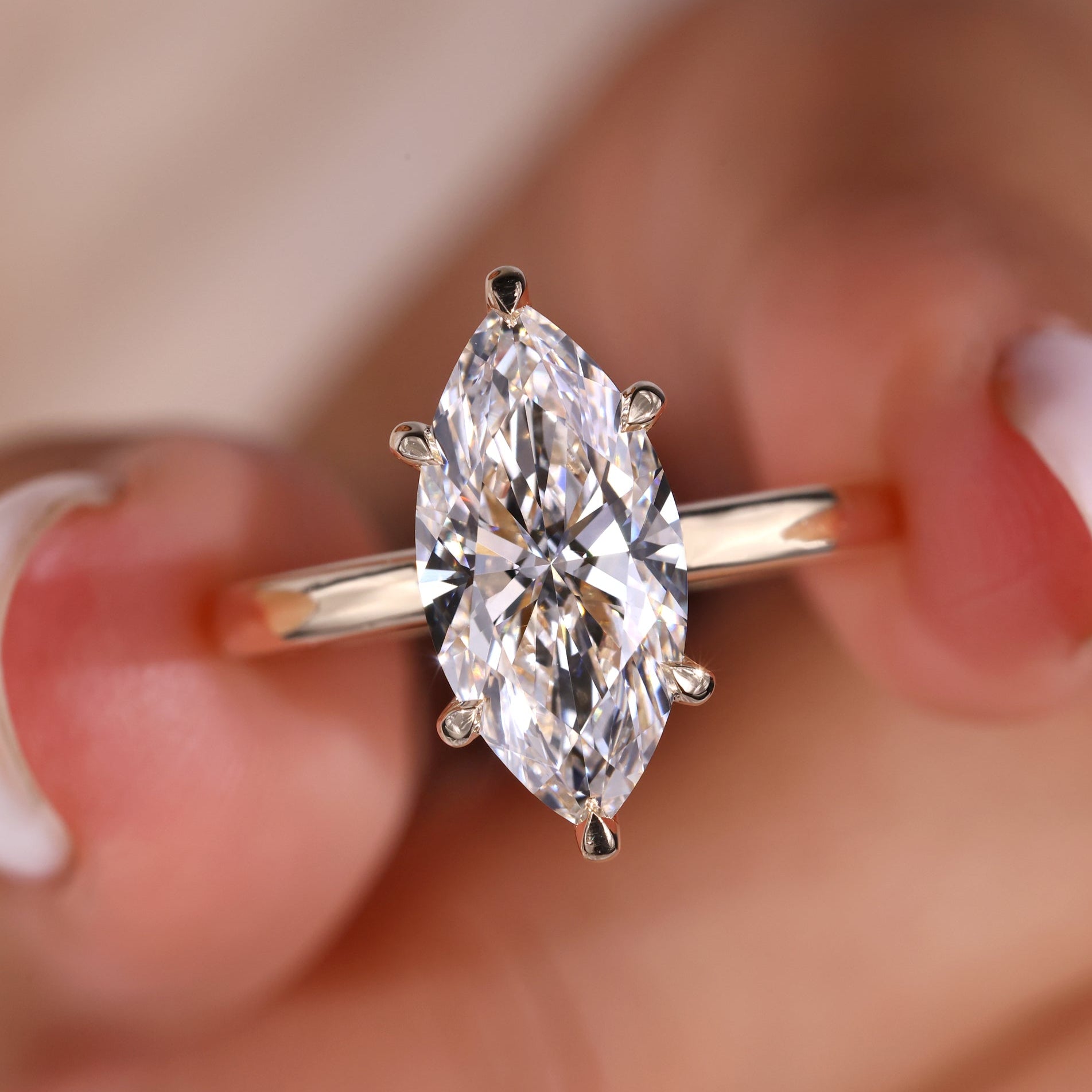Marquise diamond ring in a stunning marquise engagement ring design.