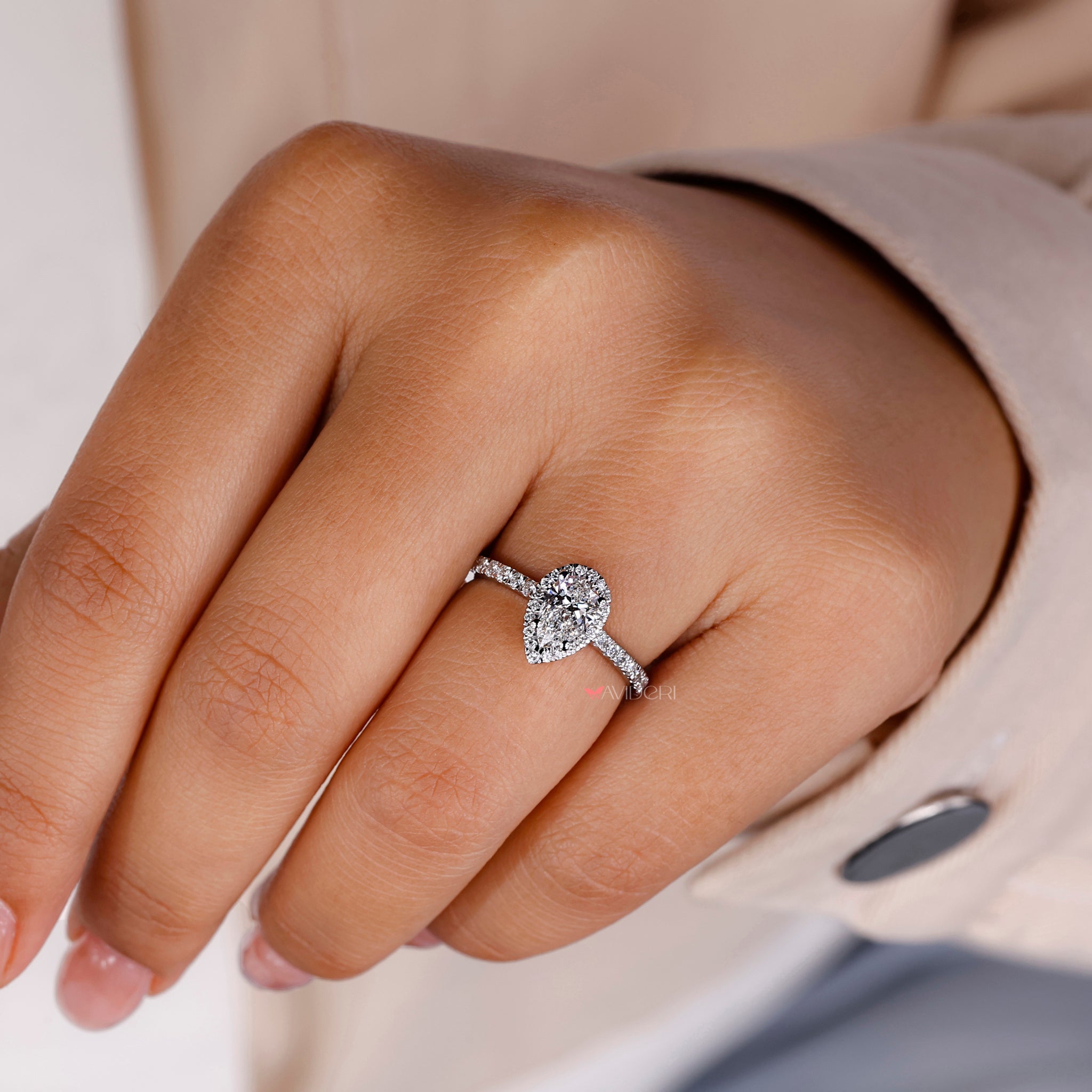 Timeless pear cut engagement ring designed with elegance and charm.