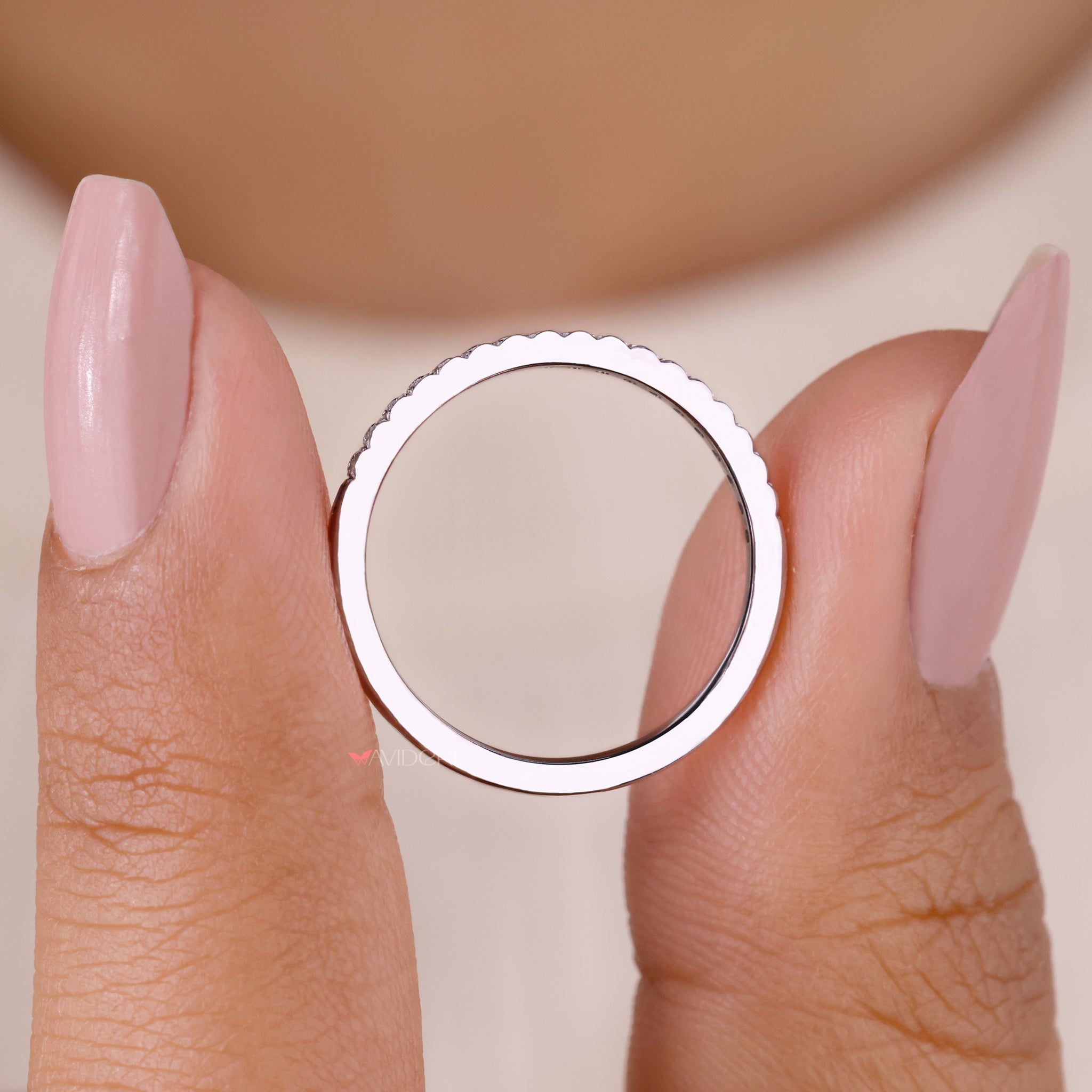 Elegant white gold band designed with round cut lab grown diamonds.