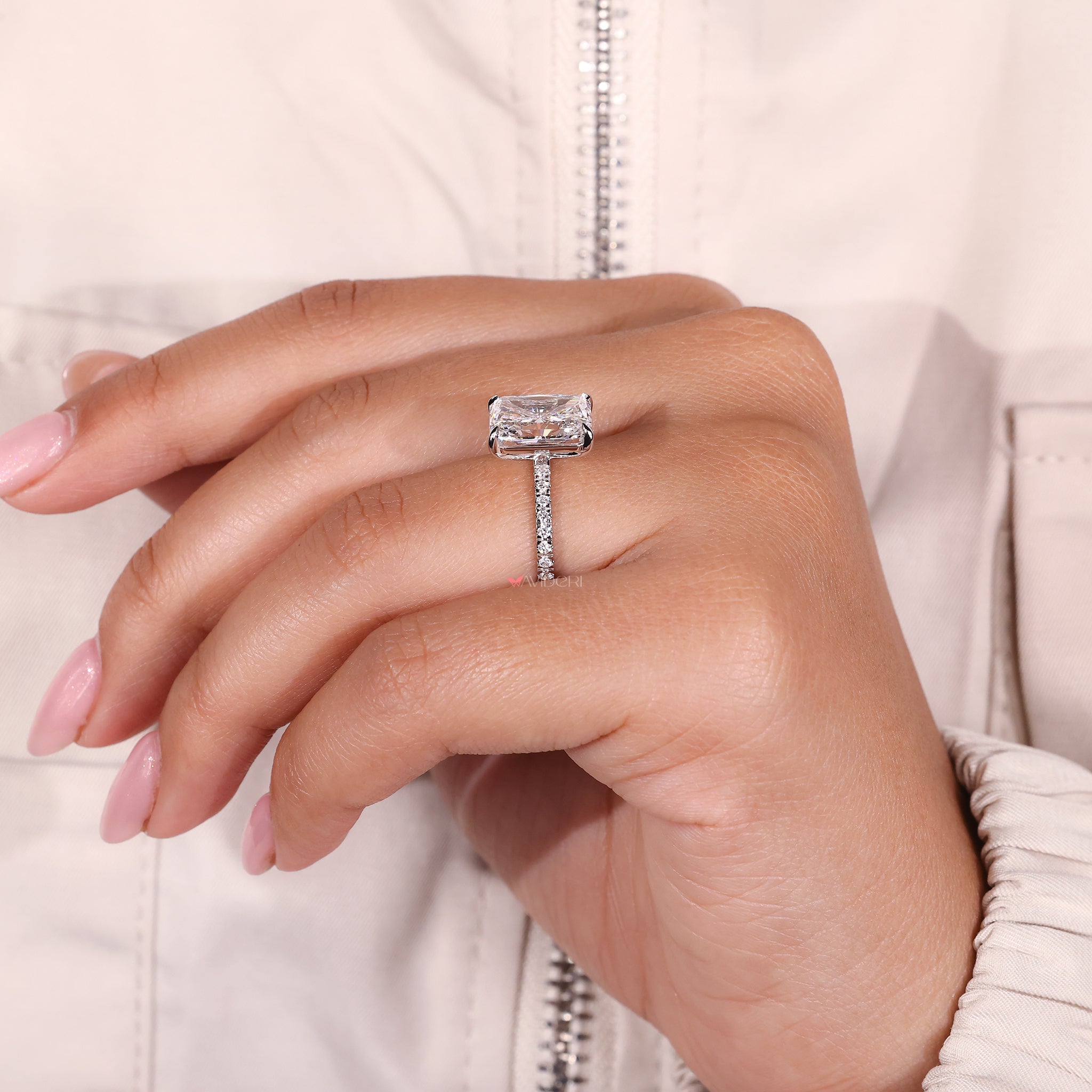 Pave Setting Ring with a radiant cut diamond, adding extra sparkle.