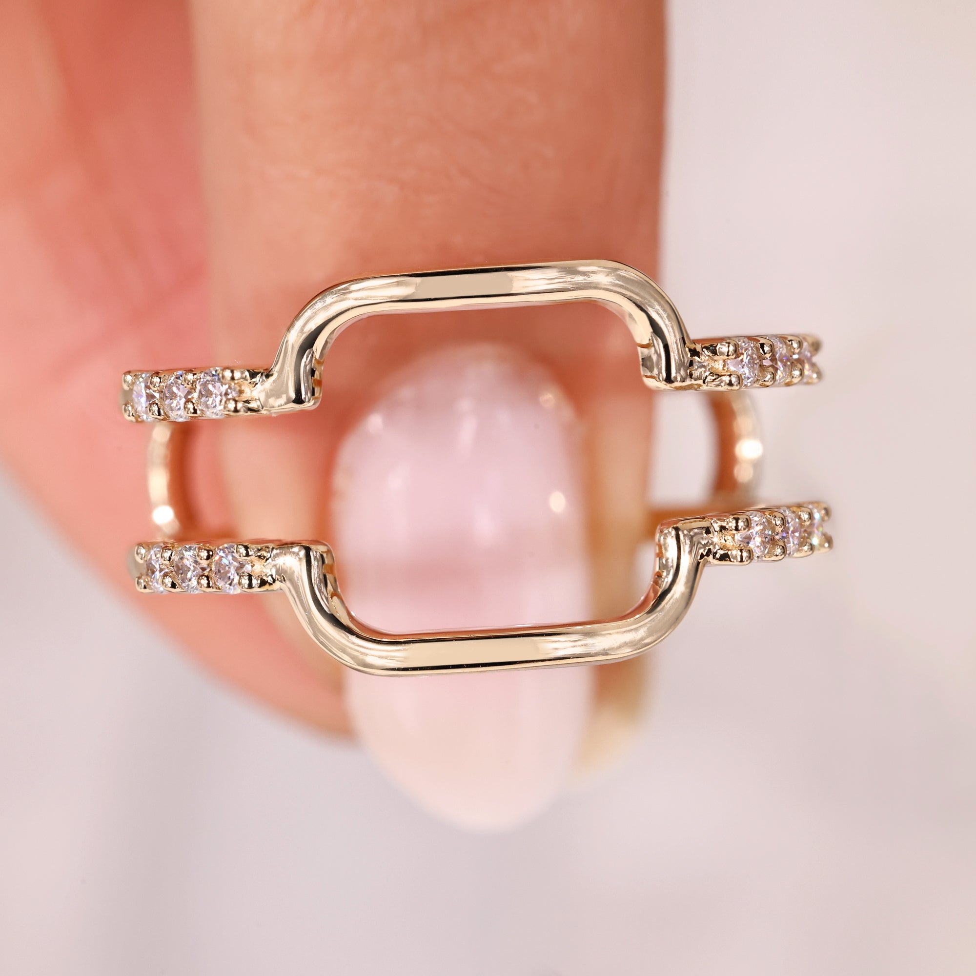 Avideri wedding band with round moissanite and open design.