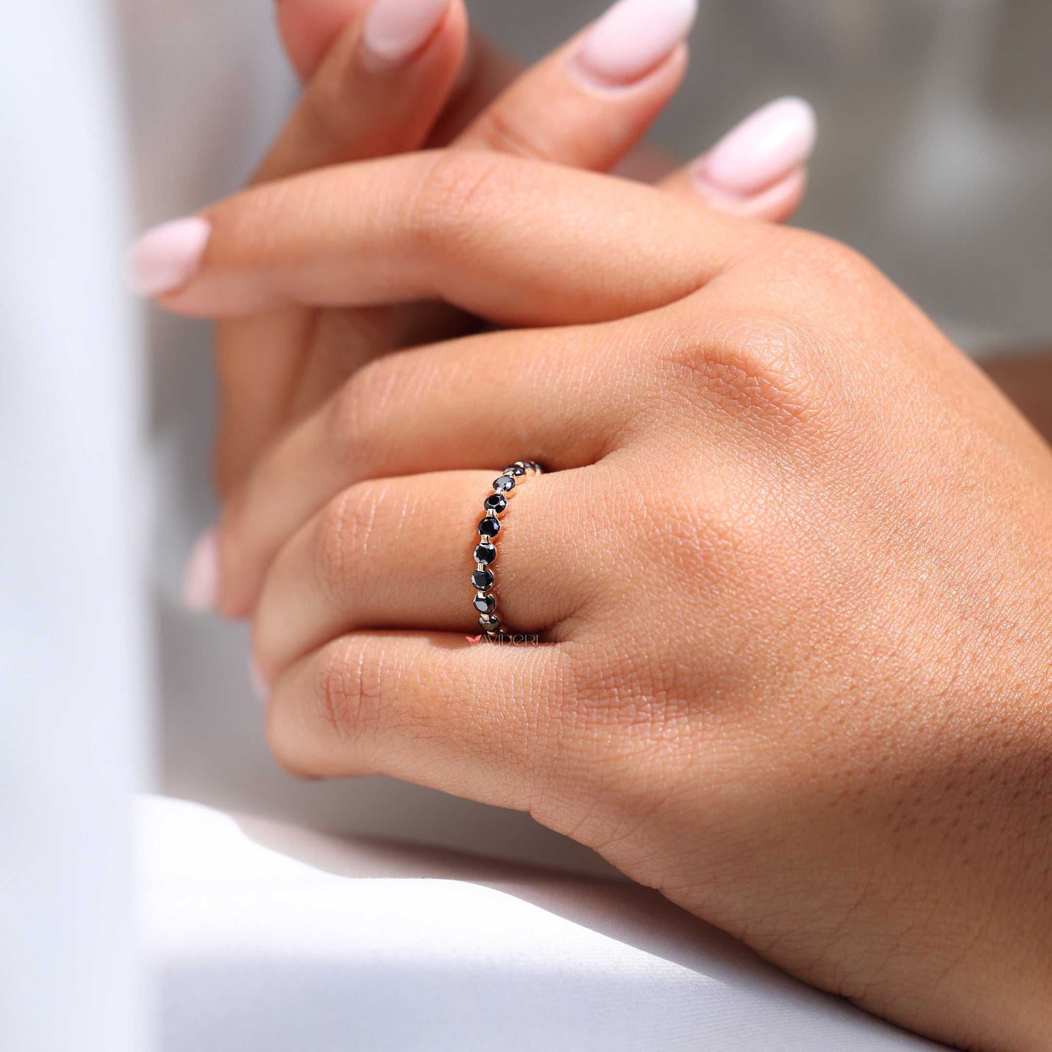 A round and marquise wedding band combines two classic shapes.