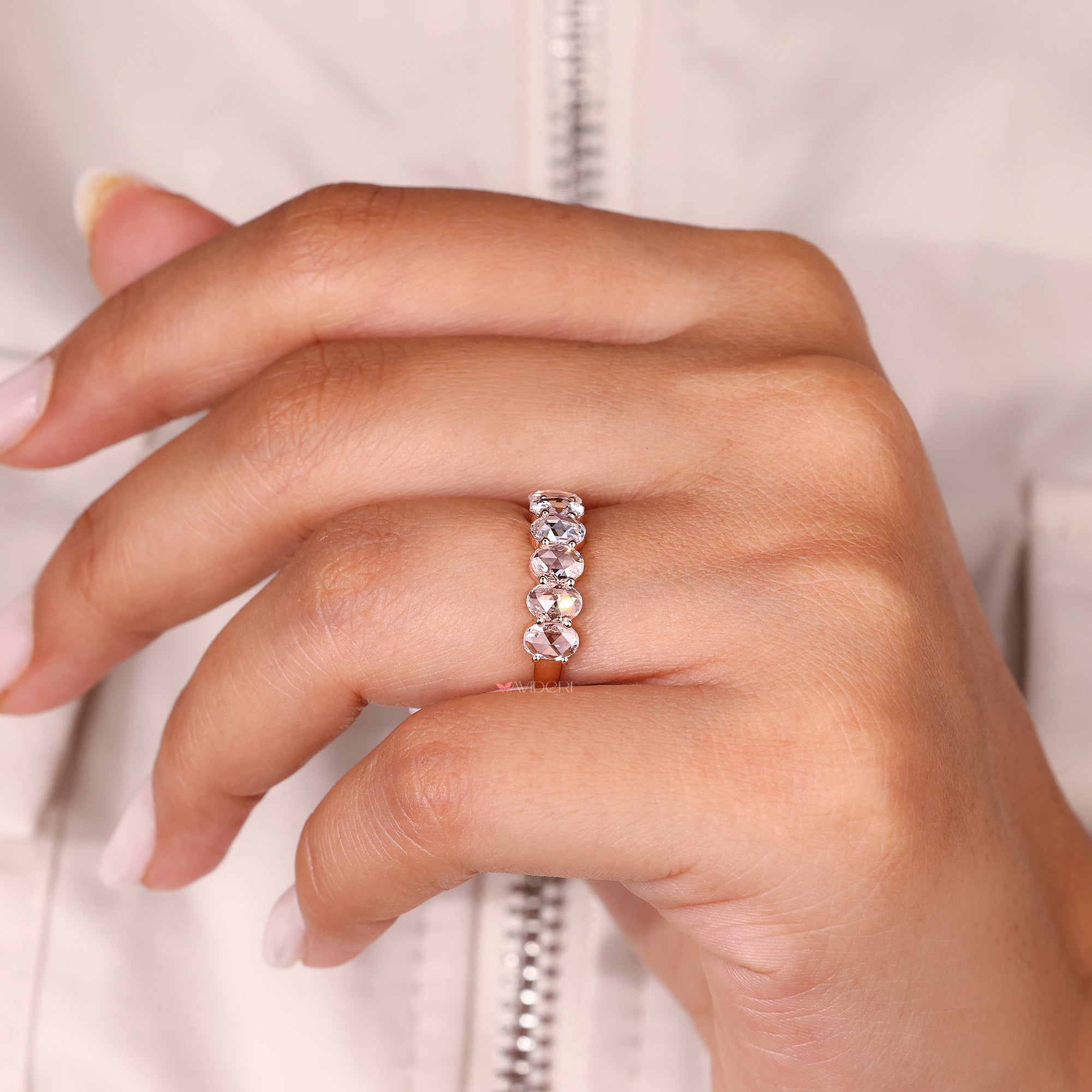 Lab grown diamond wedding band with oval rose cut stones.