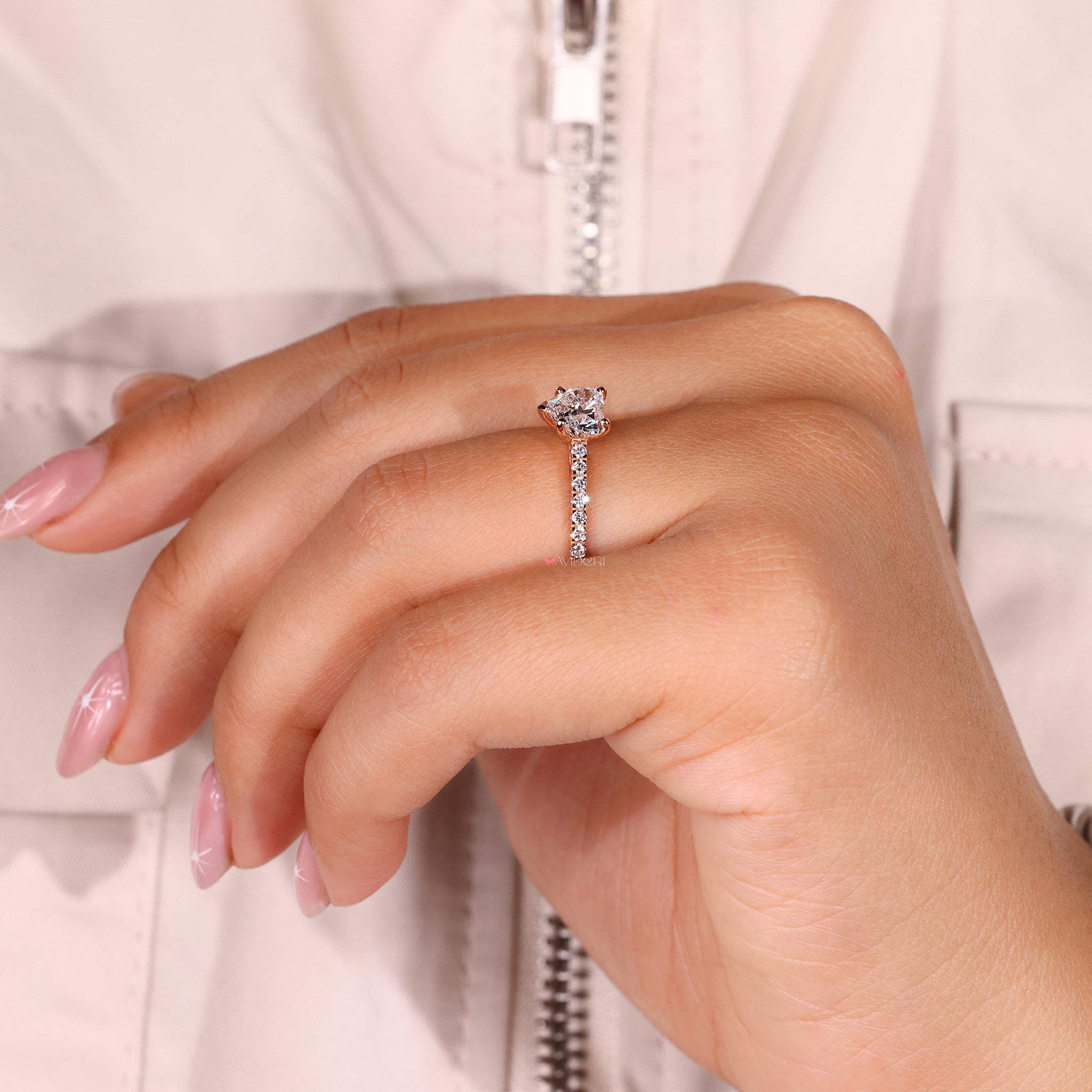 Sparkling heart shape ring diamond in a delicate setting.