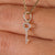 Antique key pendant in gold.
 Antique key pendant in gold.