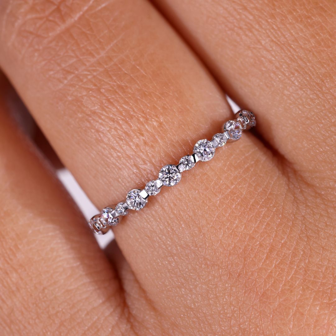 A stunning bezel wedding band featuring a minimalist design for everyday elegance.
