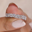 Baguette and round wedding band in white gold setting.