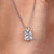 Princess cut pendant with a sharp, elegant design. Princess cut pendant with a sharp, elegant design.