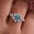 Halo engagement ring featuring a stunning round cut engagement ring design.
 Halo engagement ring featuring a stunning round cut engagement ring design.