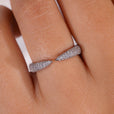 Round cut wedding band in white gold.