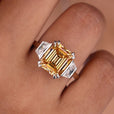 Emerald trapezoid engagement ring with stunning design.