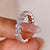 A stunning oval diamond eternity band with a sleek design, perfect for a timeless wedding look.
 A stunning oval diamond eternity band with a sleek design, perfect for a timeless wedding look.