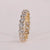 Elegant shared prong wedding band with a timeless design for lasting beauty.
 Elegant shared prong wedding band with a timeless design for lasting beauty.