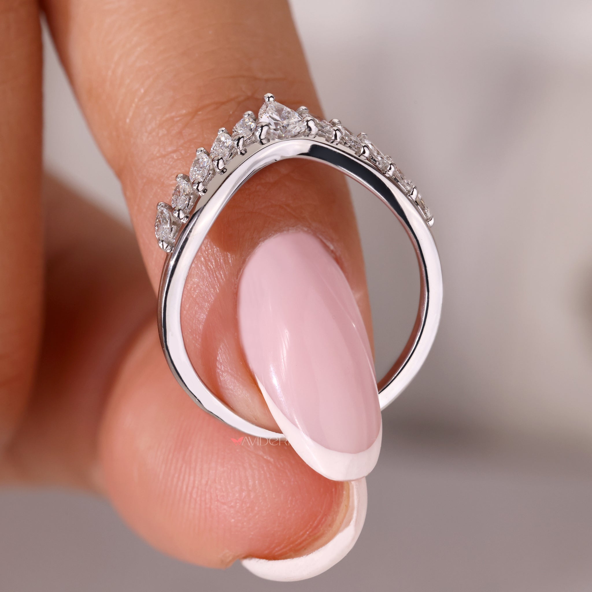 White gold diamond band with a sleek finish.