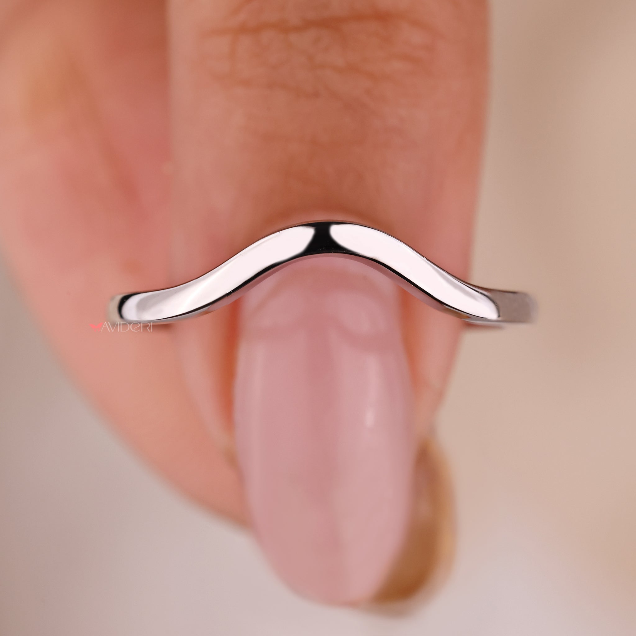 Plain wedding band in white gold, simple yet elegant for your special day.