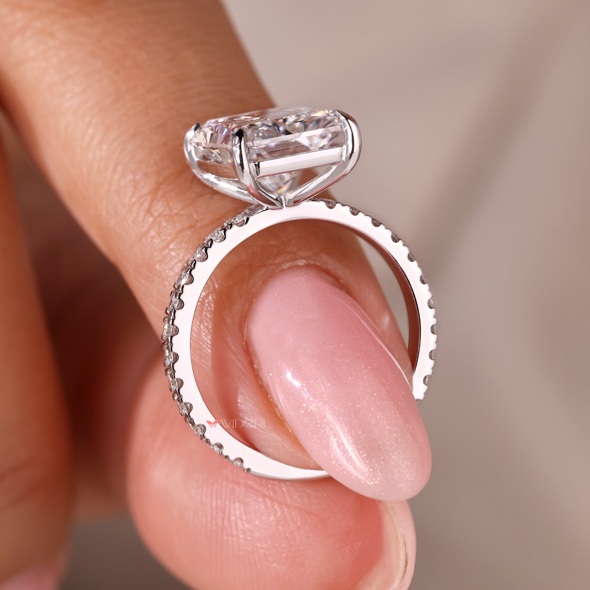 White Gold Ring featuring a radiant cut diamond for a sophisticated look.