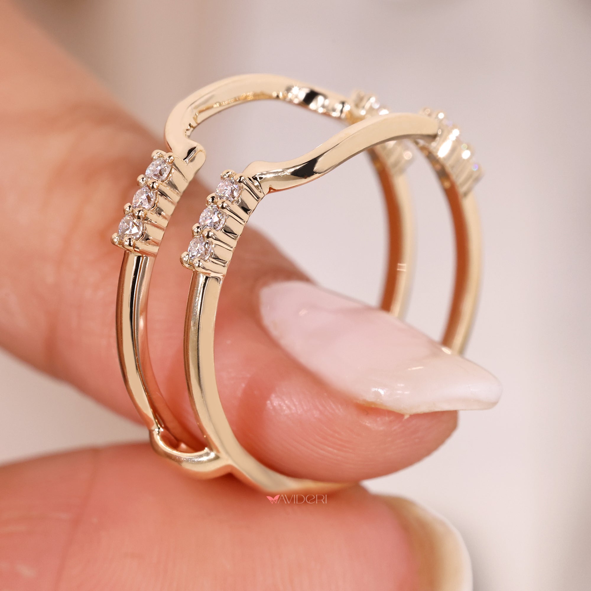 Custom curved wedding band to wrap around engagement ring.