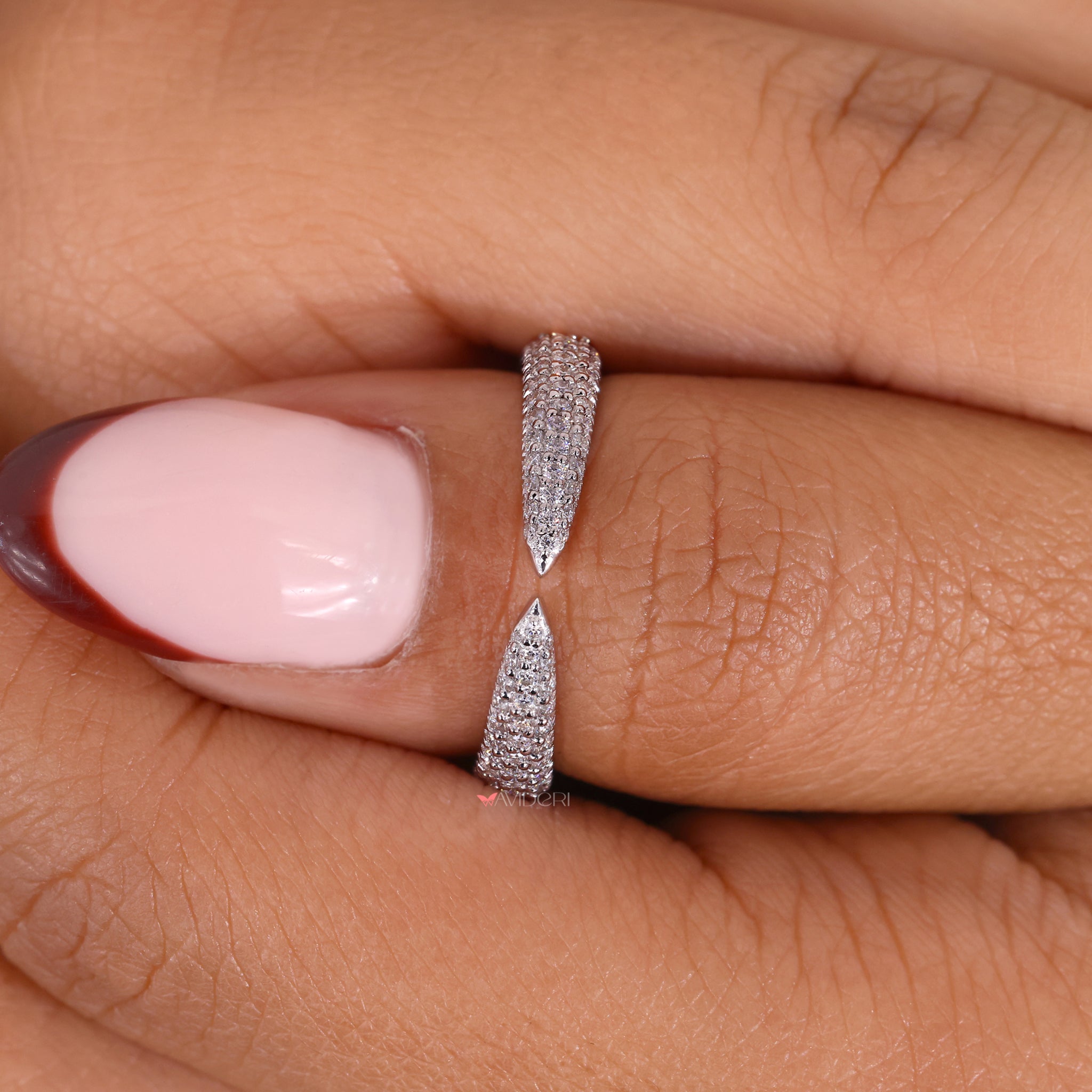 Handmade wedding band with open gap design.