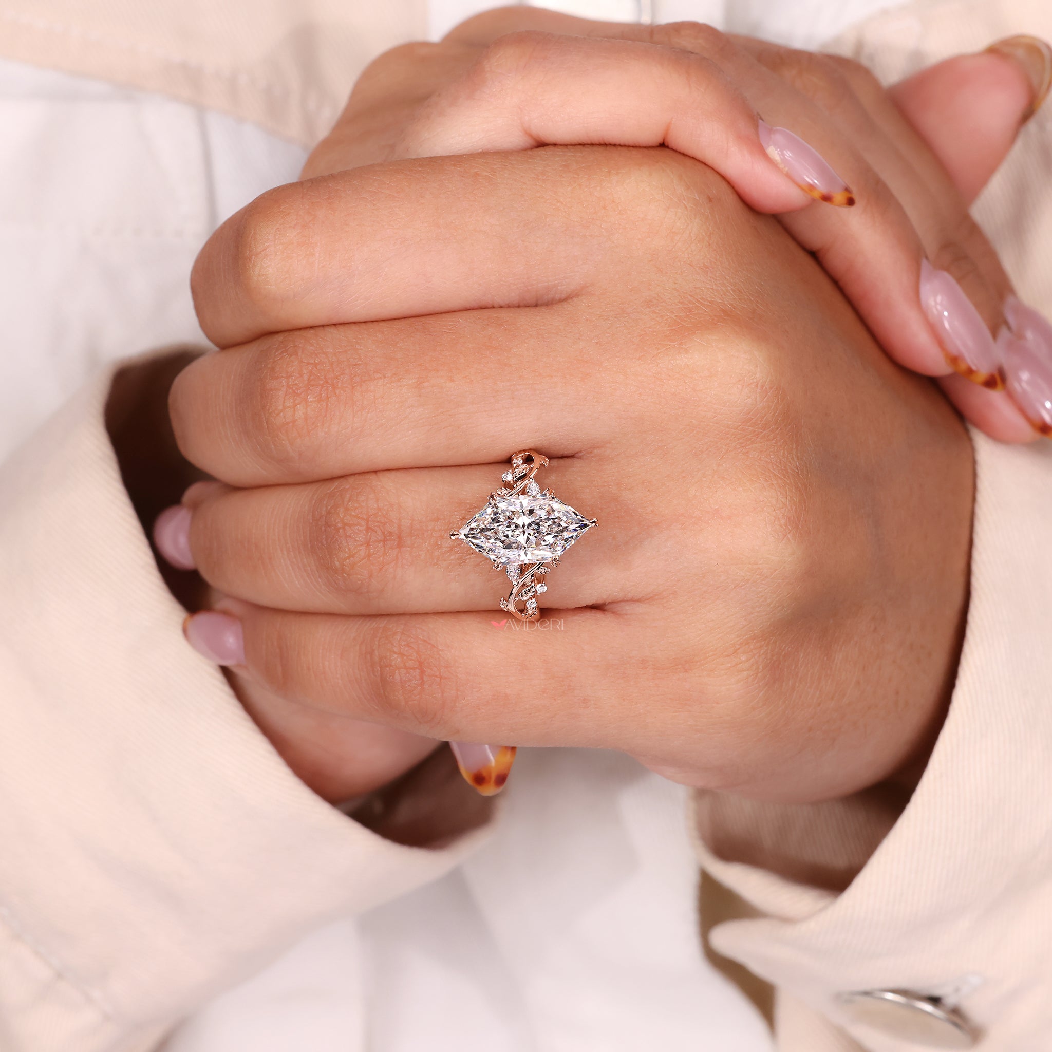 Leaf and vine engagement ring crafted with handmade jewelry for a proposal ring.