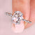 Oval rose cut engagement ring with round cut side stones. Oval rose cut engagement ring with round cut side stones.