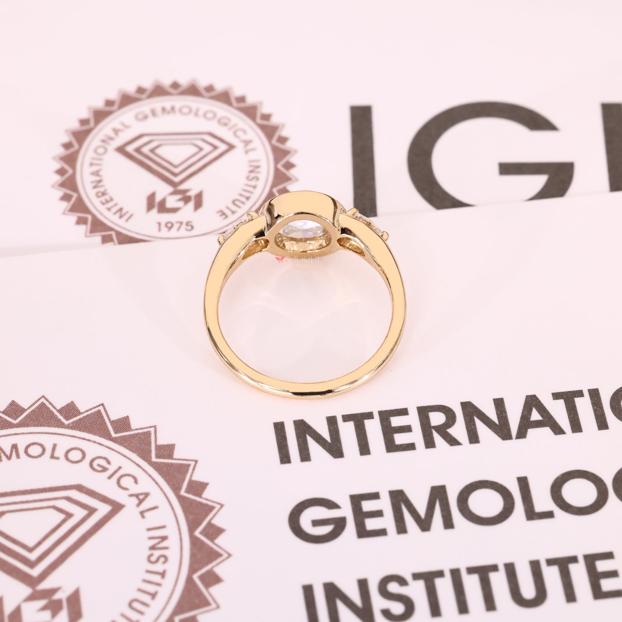 IGI certified with Bezel setting engagement ring.
