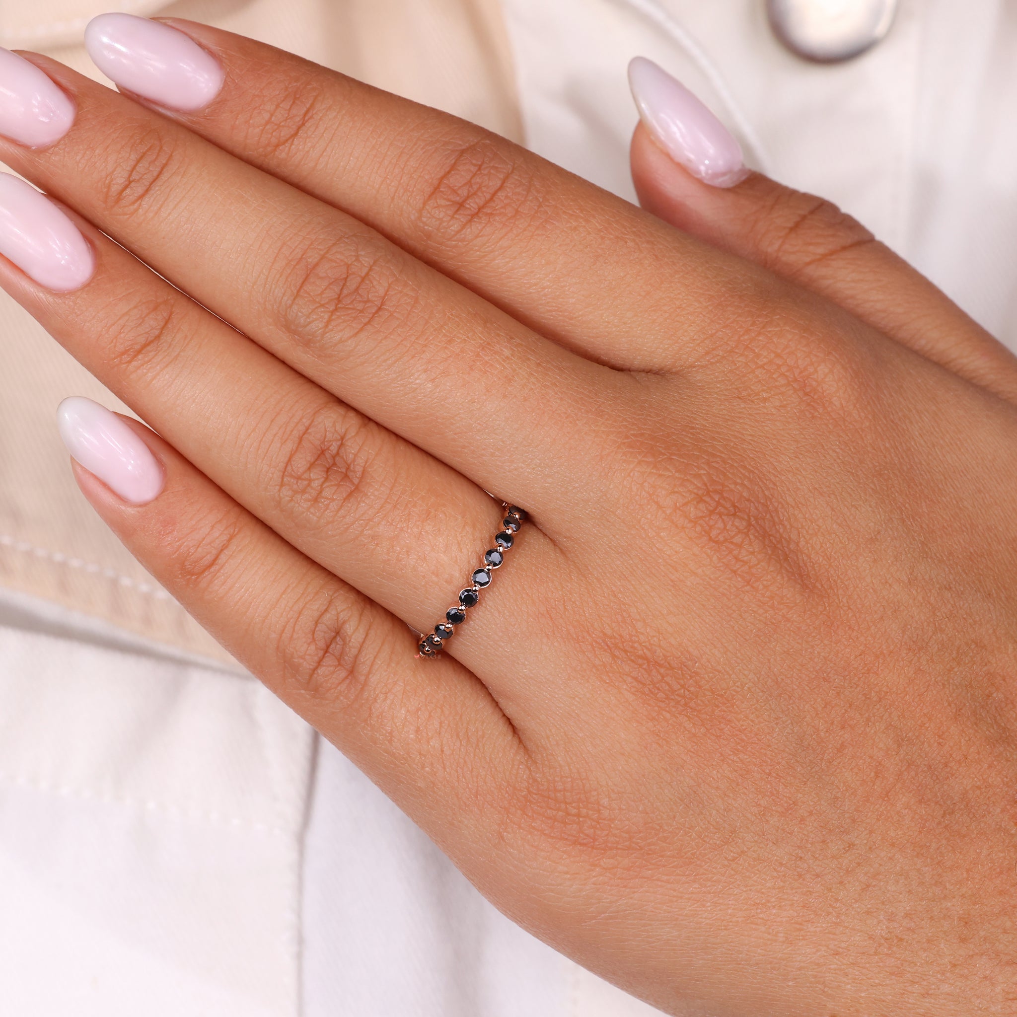 Rose gold band with moissanite wedding band design for timeless elegance.