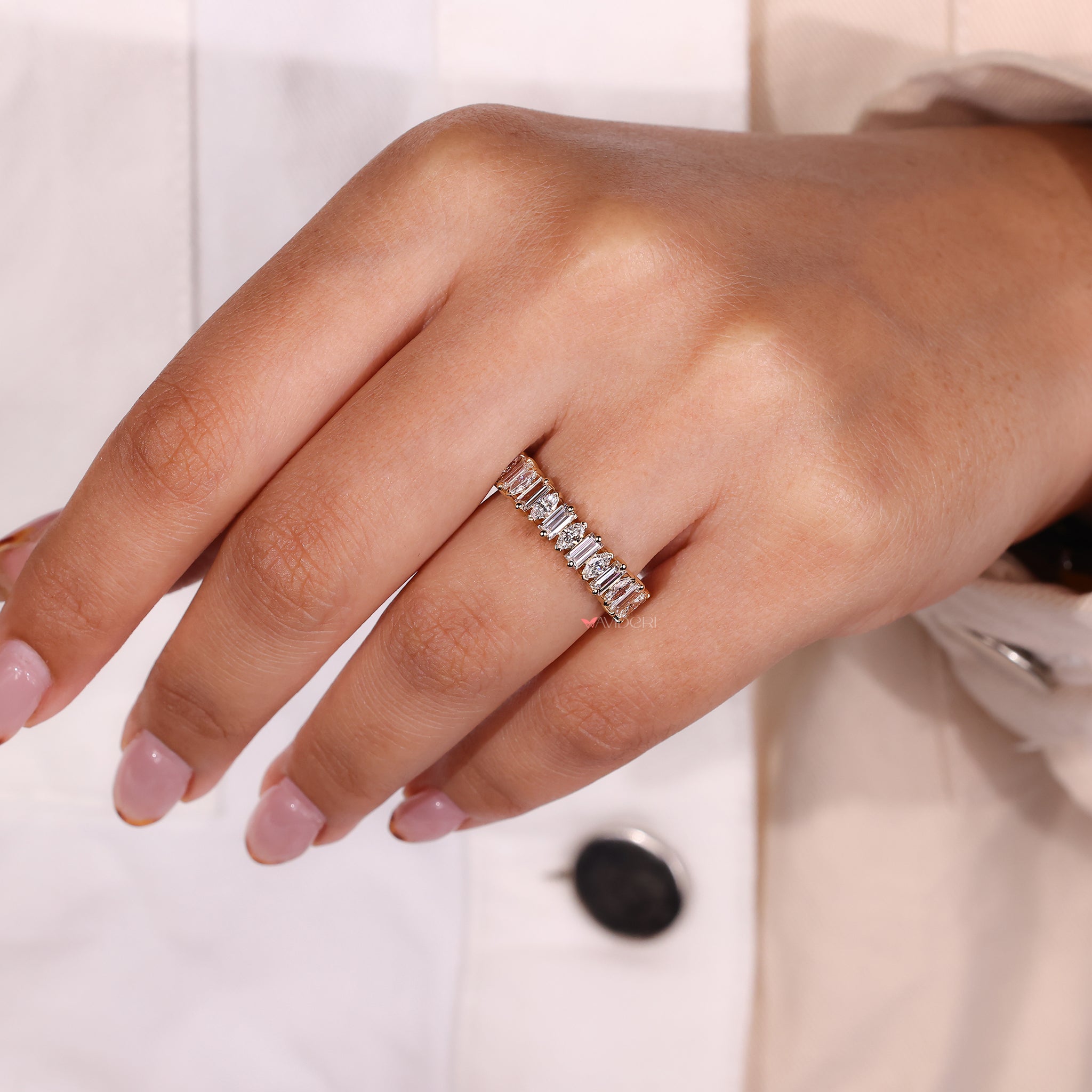 Unique Avideri band with marquise and baguette diamonds.