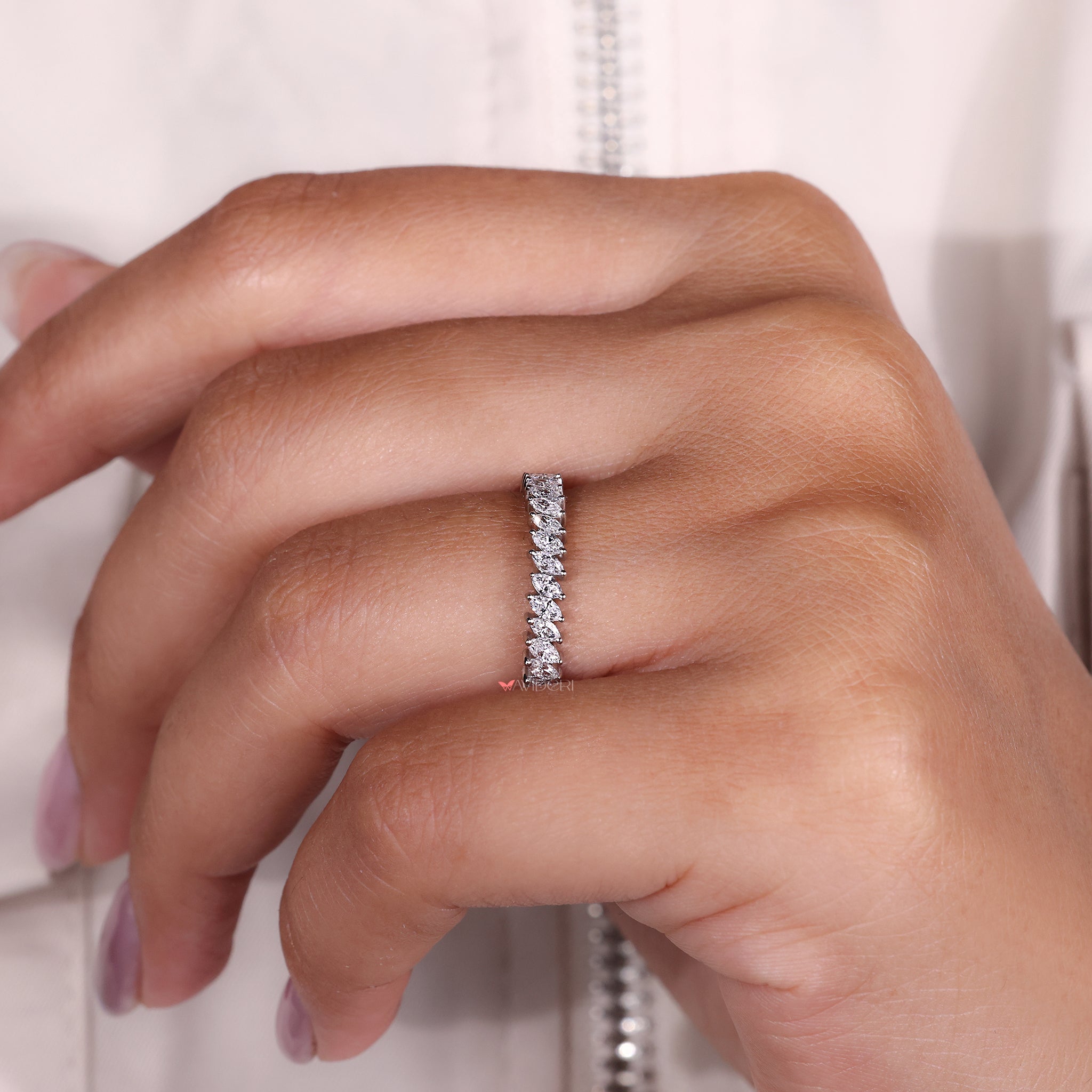 Simple wedding band offers clean and smooth design.