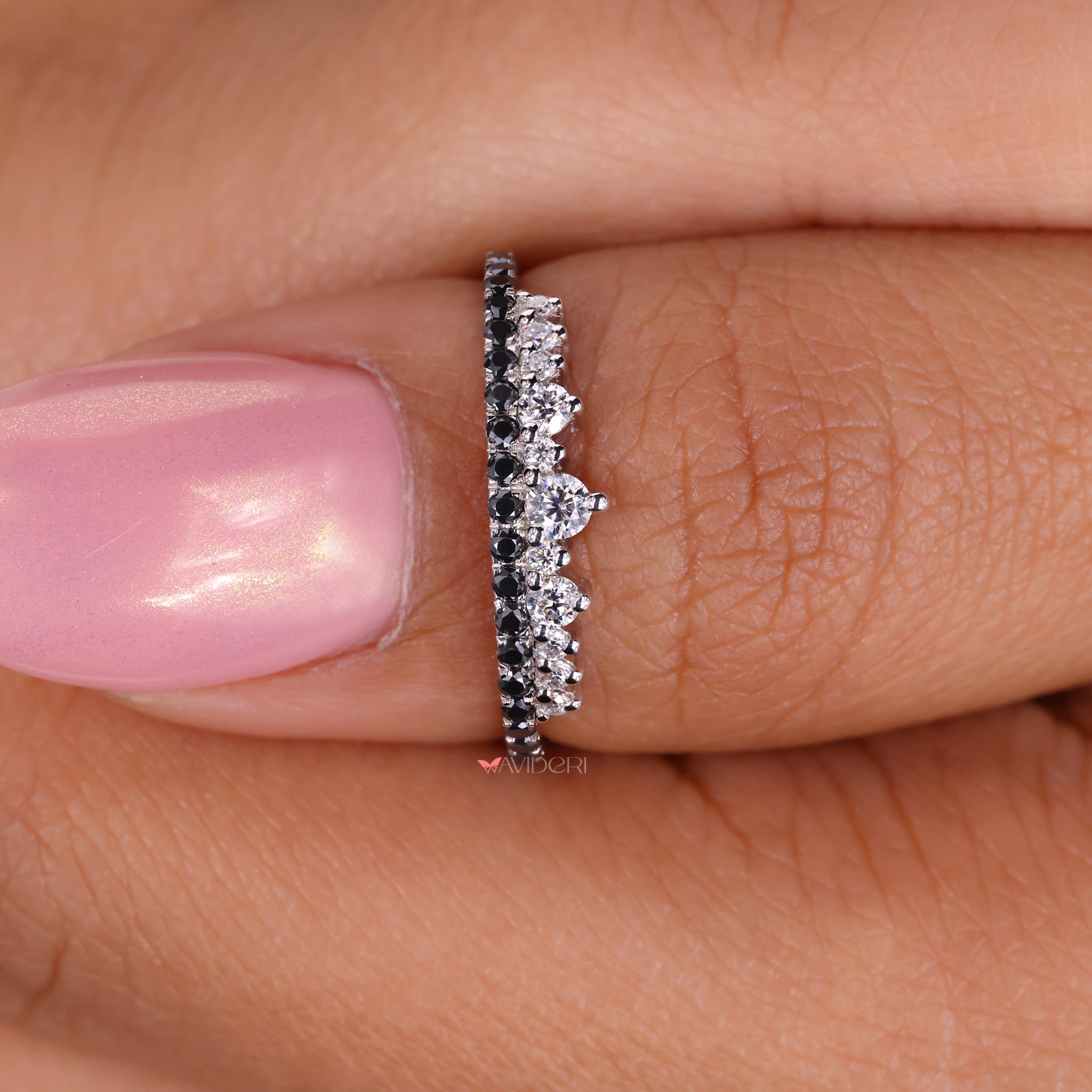 Round cut eternity band set in a beautiful white gold wedding band.