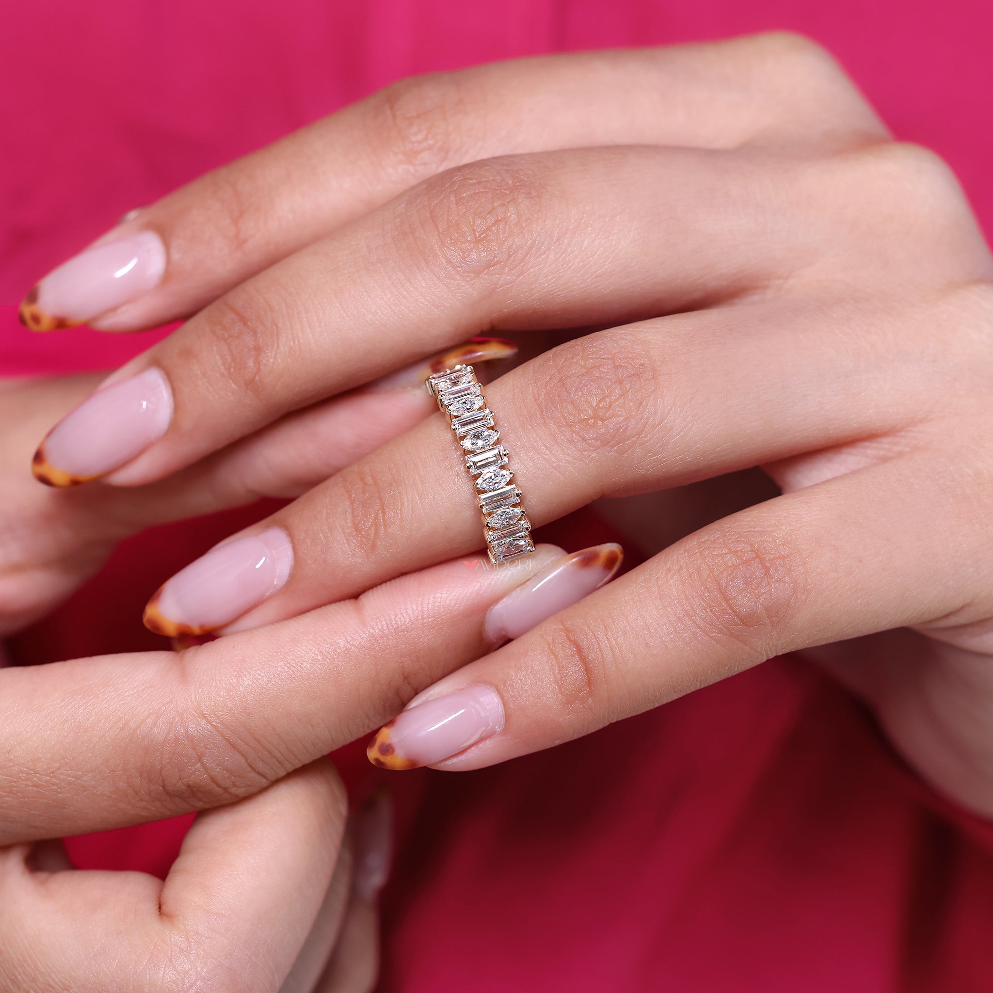 Marquise diamond wedding band crafted in yellow gold.