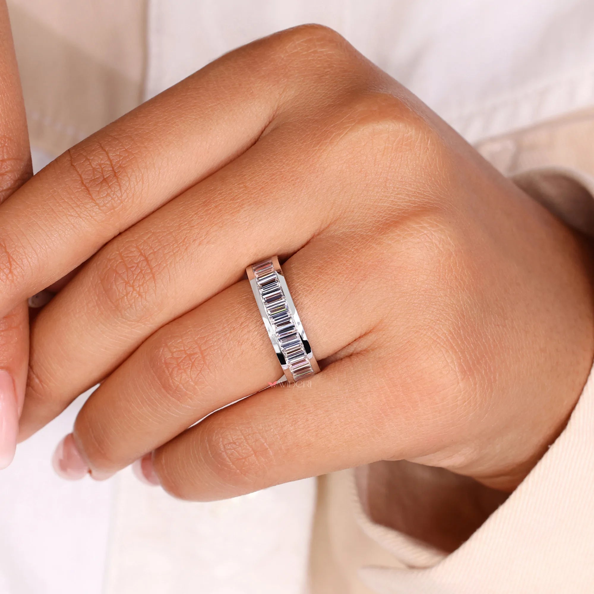 Elegant baguette wedding band with lab-grown diamonds, perfect for bridal wear.