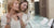 Woman Explore moissanite and diamond Jewelry in a store