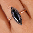 A long marquise ring set in a sleek band.